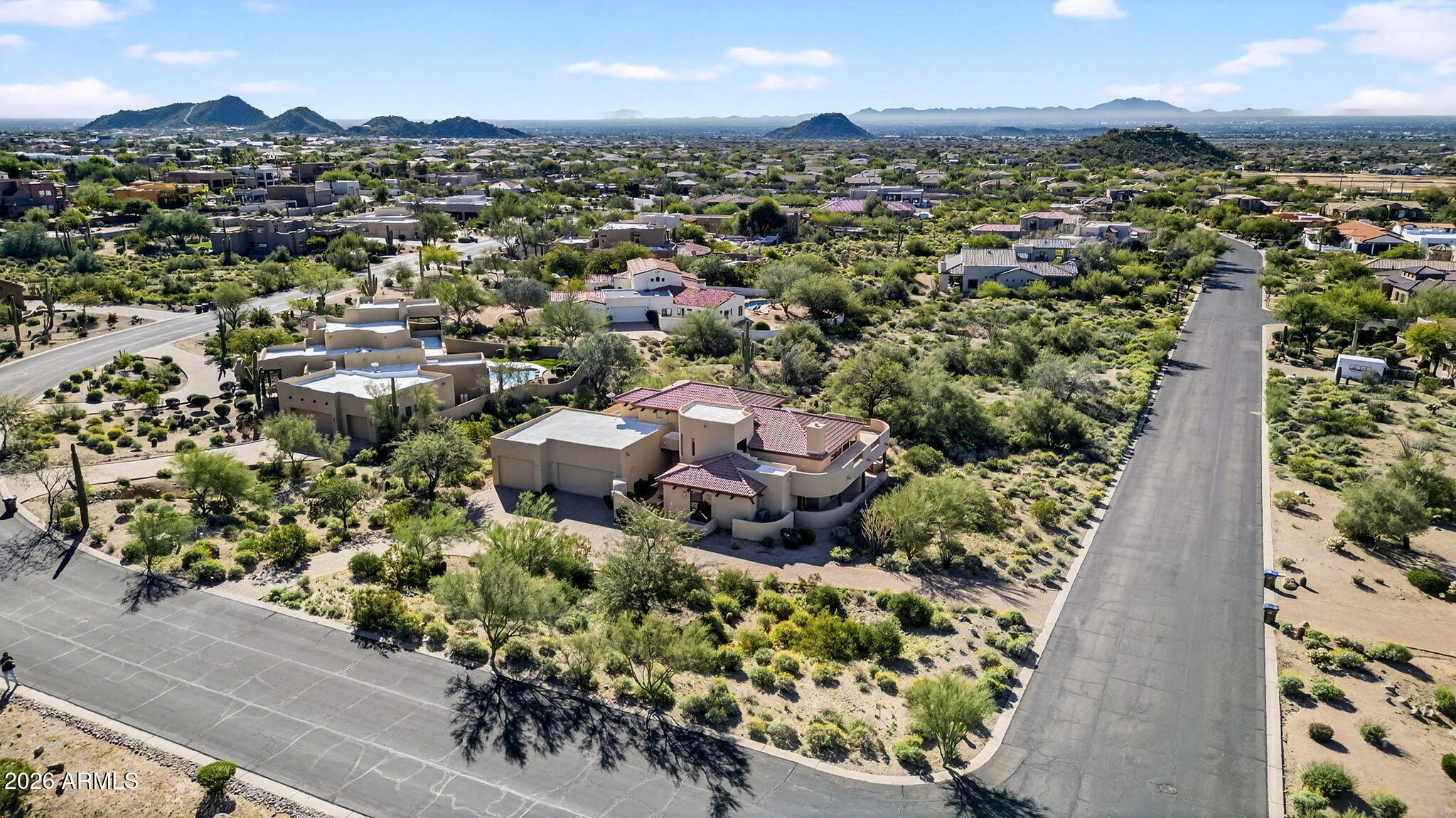 8540 East McDowell Road, Unit 110 Mesa, AZ 85207 - Photo 55 of 74 an aerial view of a city with lots of residential buildings
