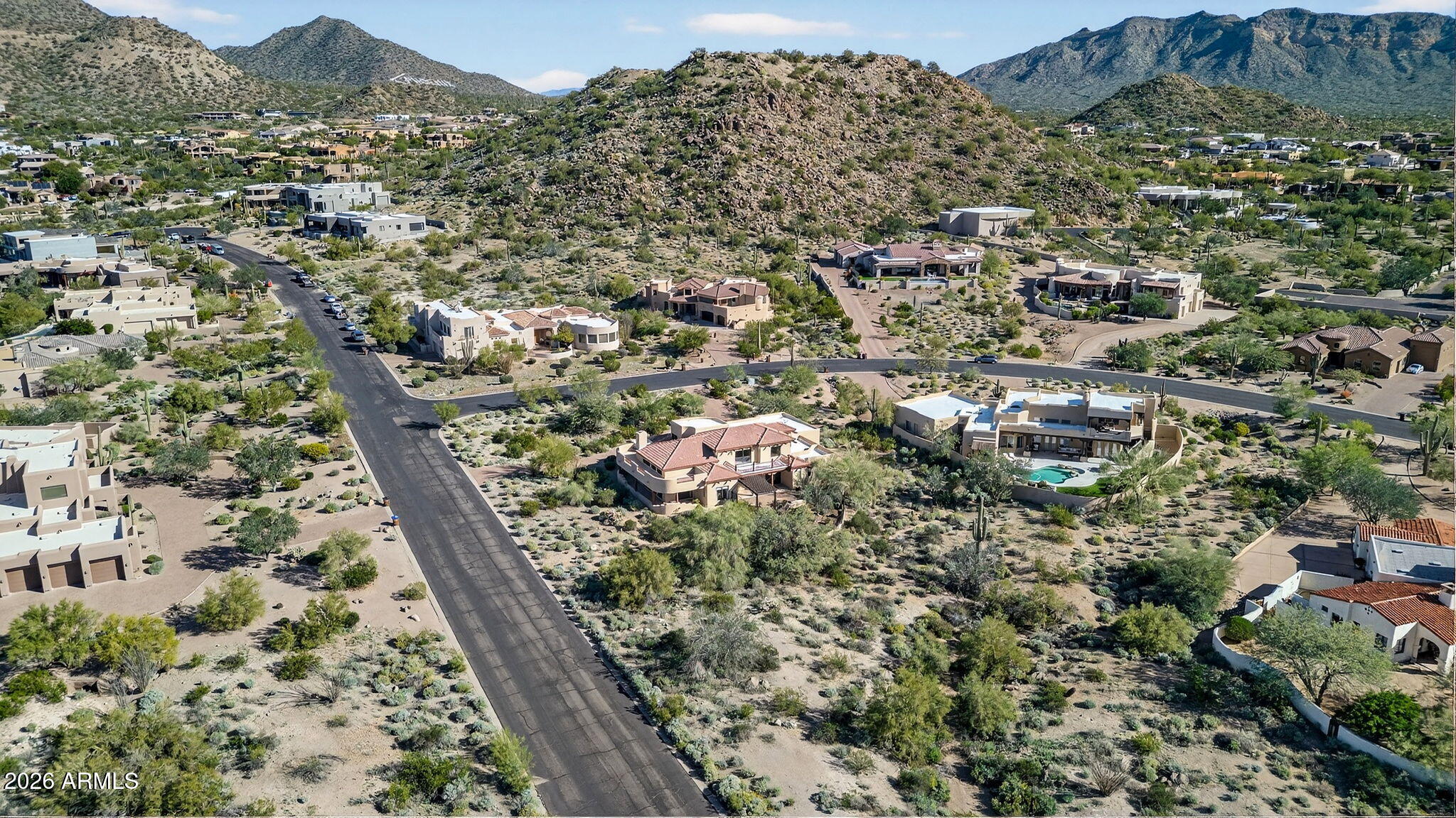 8540 East McDowell Road, Unit 110 Mesa, AZ 85207 - Photo 64 of 74 an aerial view of residential houses with outdoor space