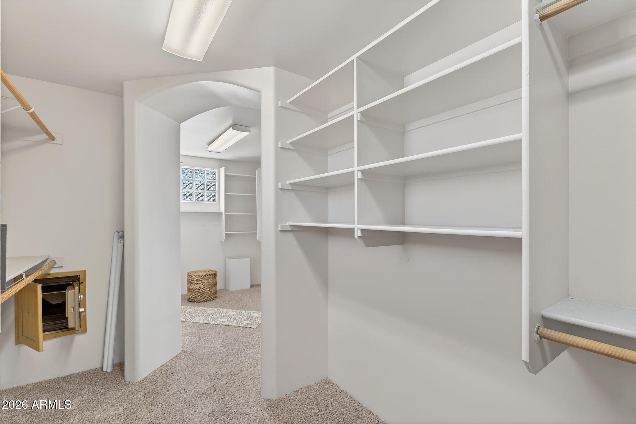 8540 East McDowell Road, Unit 110 Mesa, AZ 85207 - Photo 67 of 74 a view of an empty room with empty racks