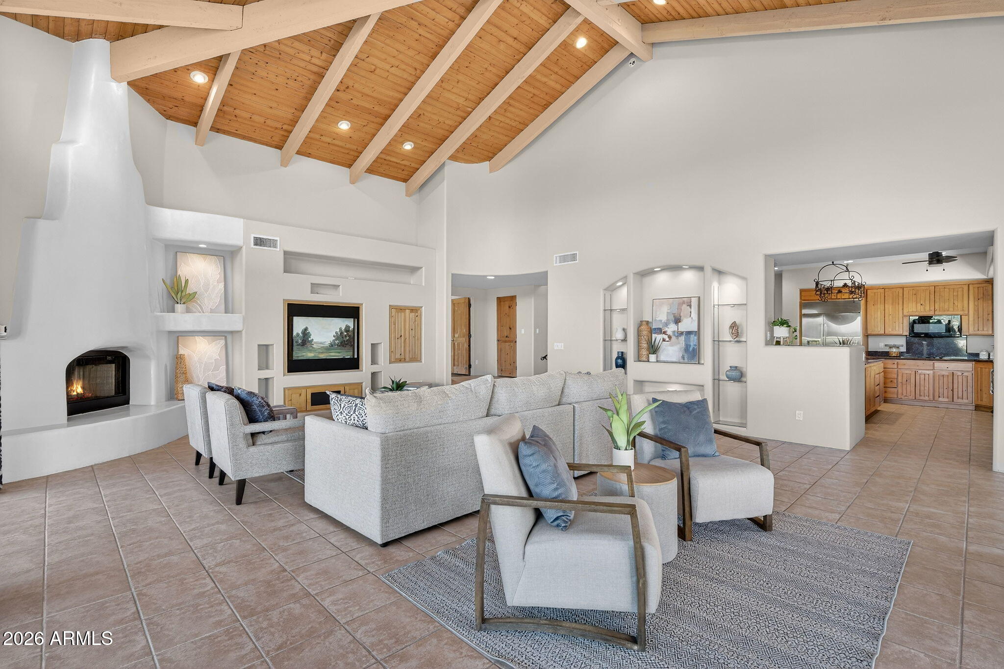 8540 East McDowell Road, Unit 110 Mesa, AZ 85207 - Photo 5 of 74 a living room with furniture and a fireplace