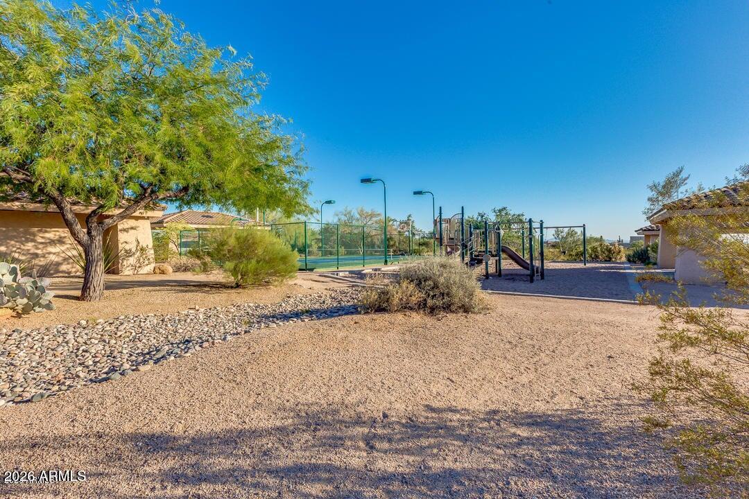 8540 East McDowell Road, Unit 110 Mesa, AZ 85207 - Photo 72 of 74 a view of a yard with trees