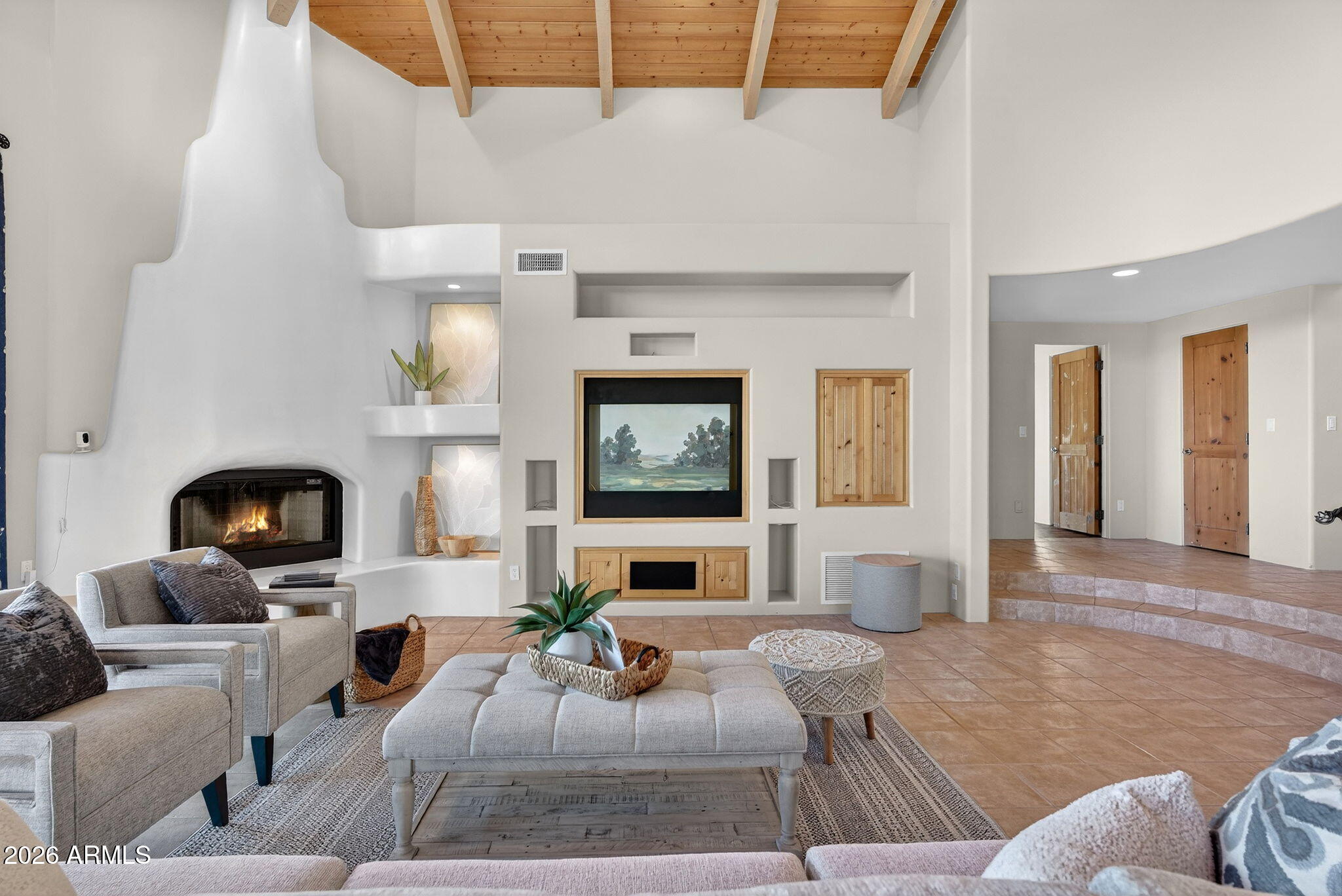 8540 East McDowell Road, Unit 110 Mesa, AZ 85207 - Photo 7 of 74 a living room with furniture and a fireplace
