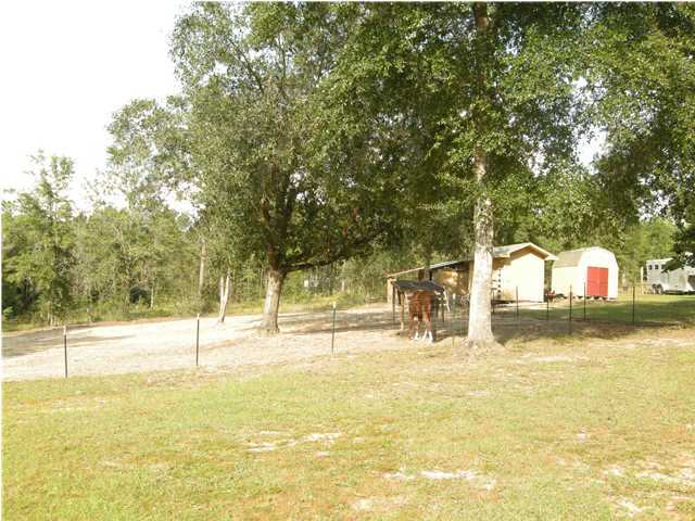 1083 Tallokas Road Crestview, FL 32536 - Photo 35 of 35 a view of a house with swimming pool