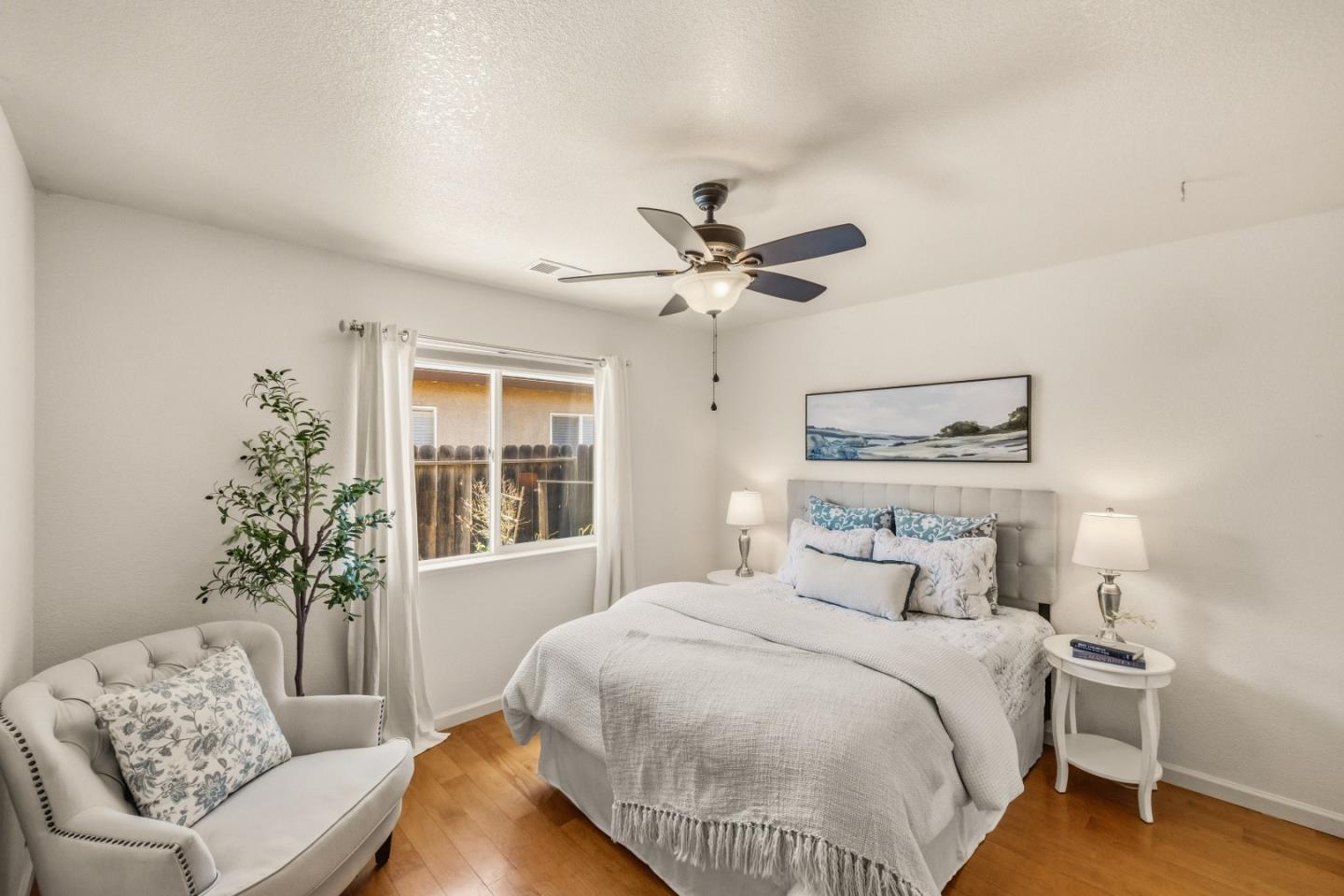 750 Ruger Court Hollister, CA 95023 - Photo 11 of 15 a bedroom with a large bed and a couch