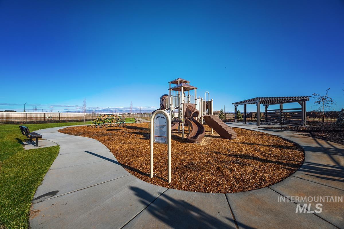 1700 East Hadler Street Meridian, ID 83642 - Photo 23 of 25 Community playground featuring a multi-level play structure, slide, and climbing dome