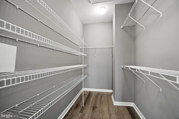 a view of a room with wooden floor and floors