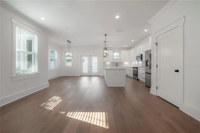 a view of kitchen and windows