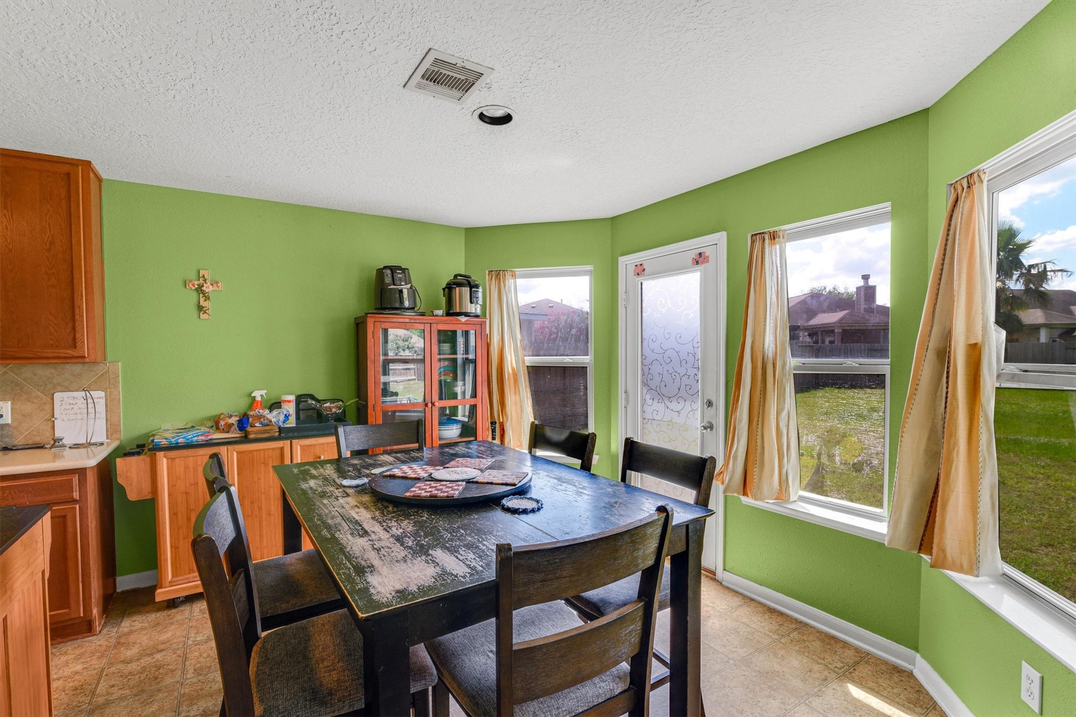 3003 Legends York Drive Spring, TX 77386 - Photo 10 of 29 a view of a dining room with furniture window and outside view