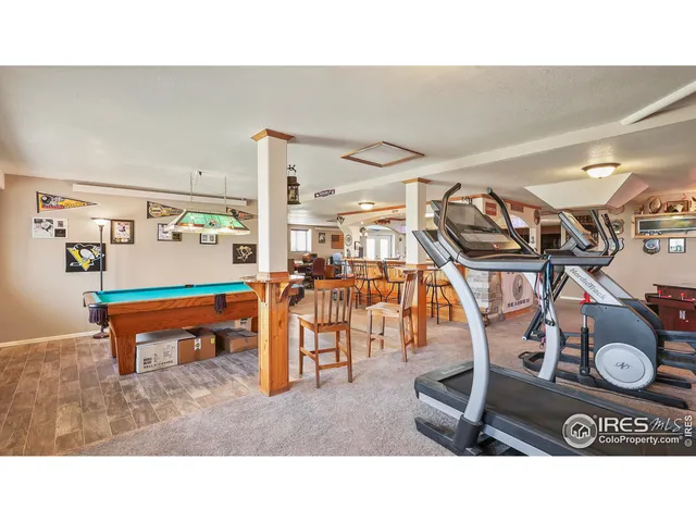 a room with lots of furniture and lots of wooden furniture