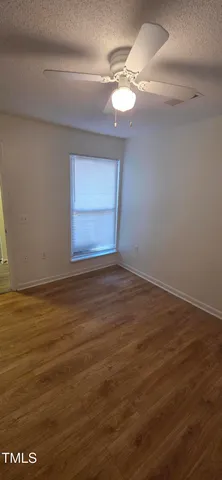 a bathroom with a toilet a sink and shower