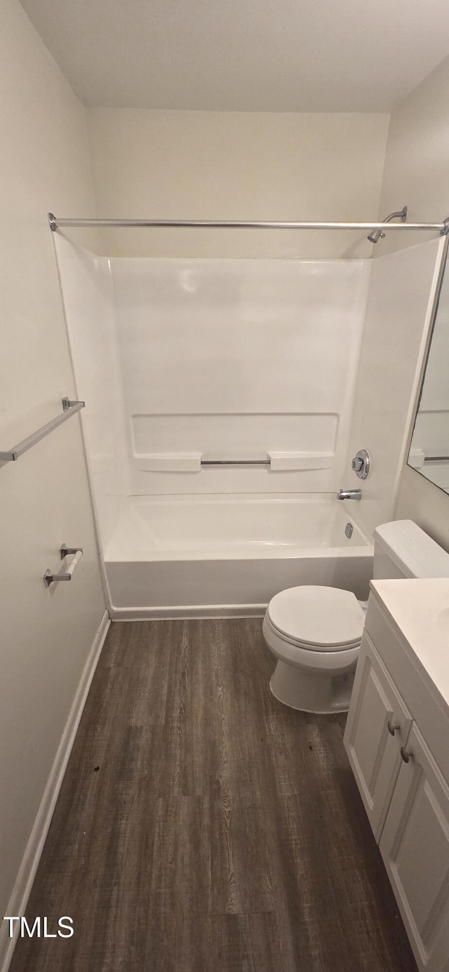 1401 Collegiate Circle, Unit 104 Raleigh, NC 27606 - Photo 28 of 29 a view of bathroom with a toilet and a shower