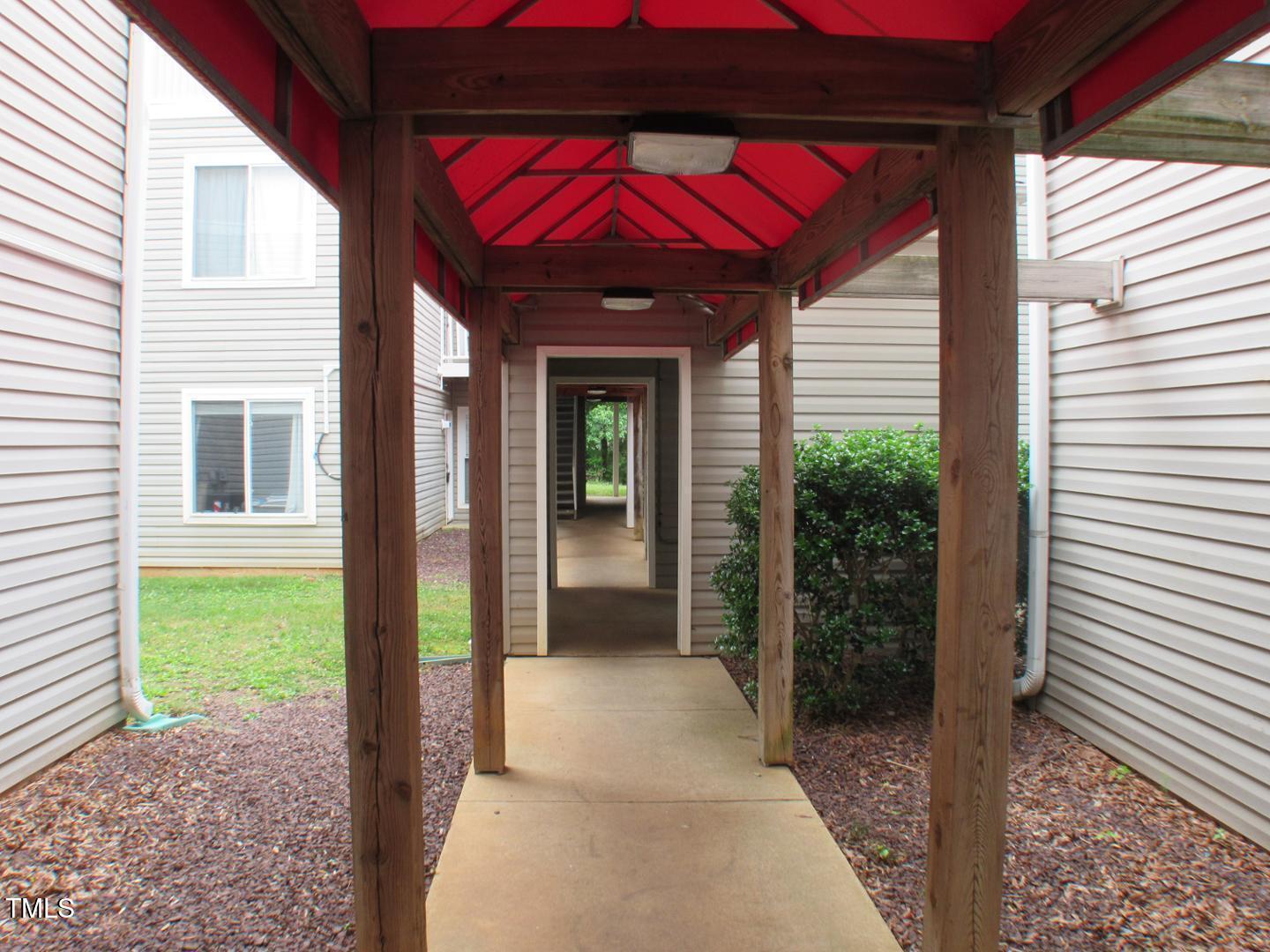 1401 Collegiate Circle, Unit 104 Raleigh, NC 27606 - Photo 3 of 29 a view of a entryway door front of house