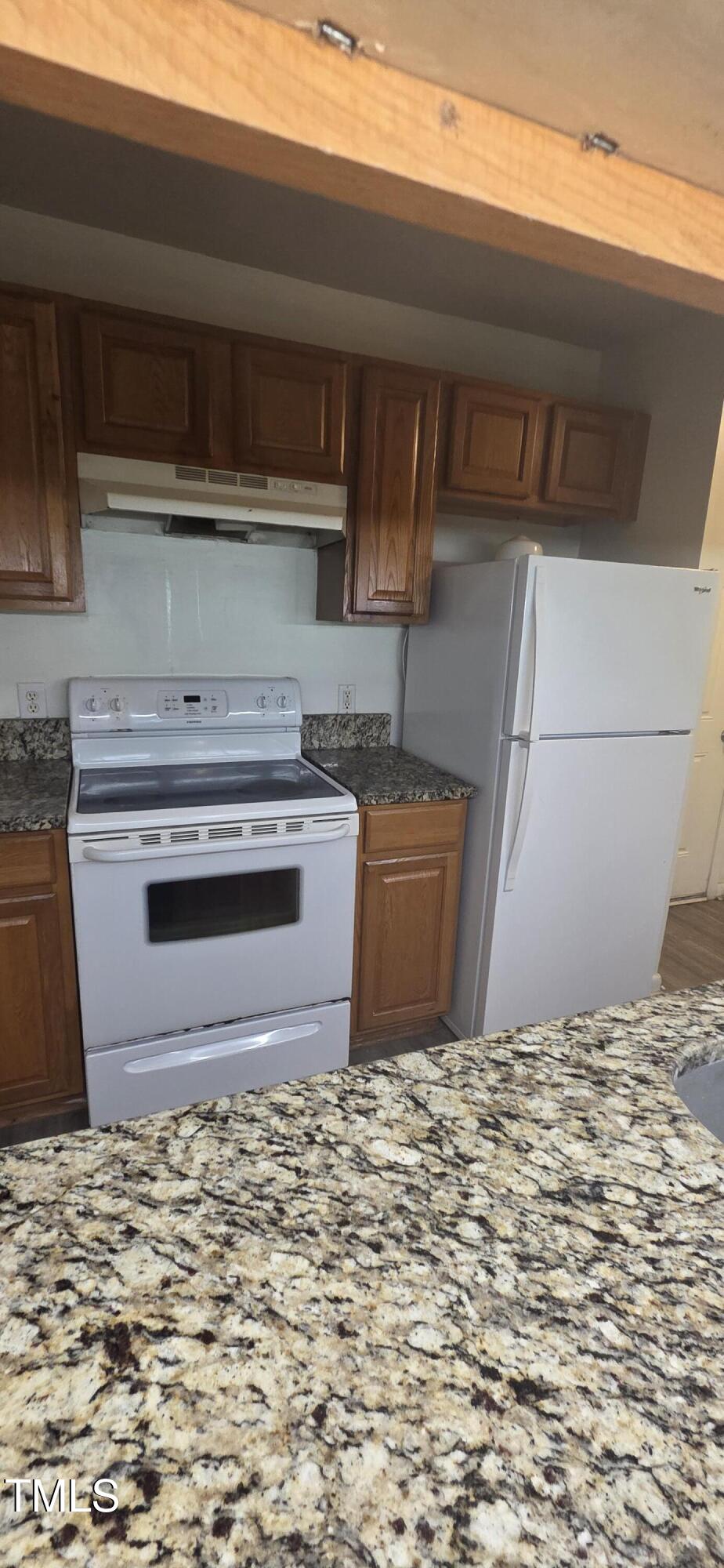 1401 Collegiate Circle, Unit 104 Raleigh, NC 27606 - Photo 5 of 29 a view of a kitchen