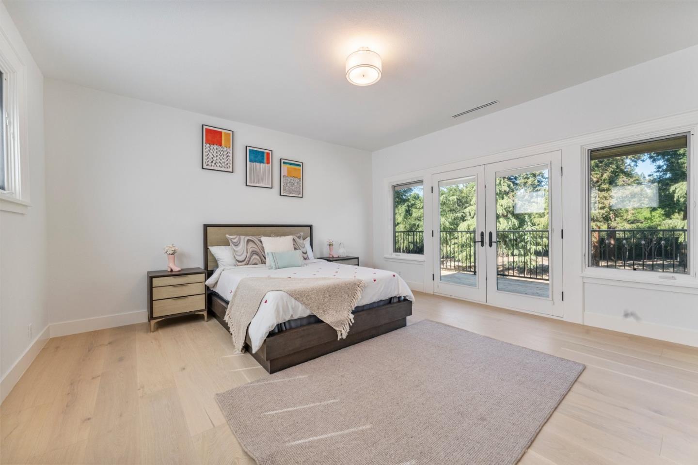 1080 Finley Road Pleasanton, CA 94588 - Photo 52 of 85 a spacious bedroom with a bed and a large window