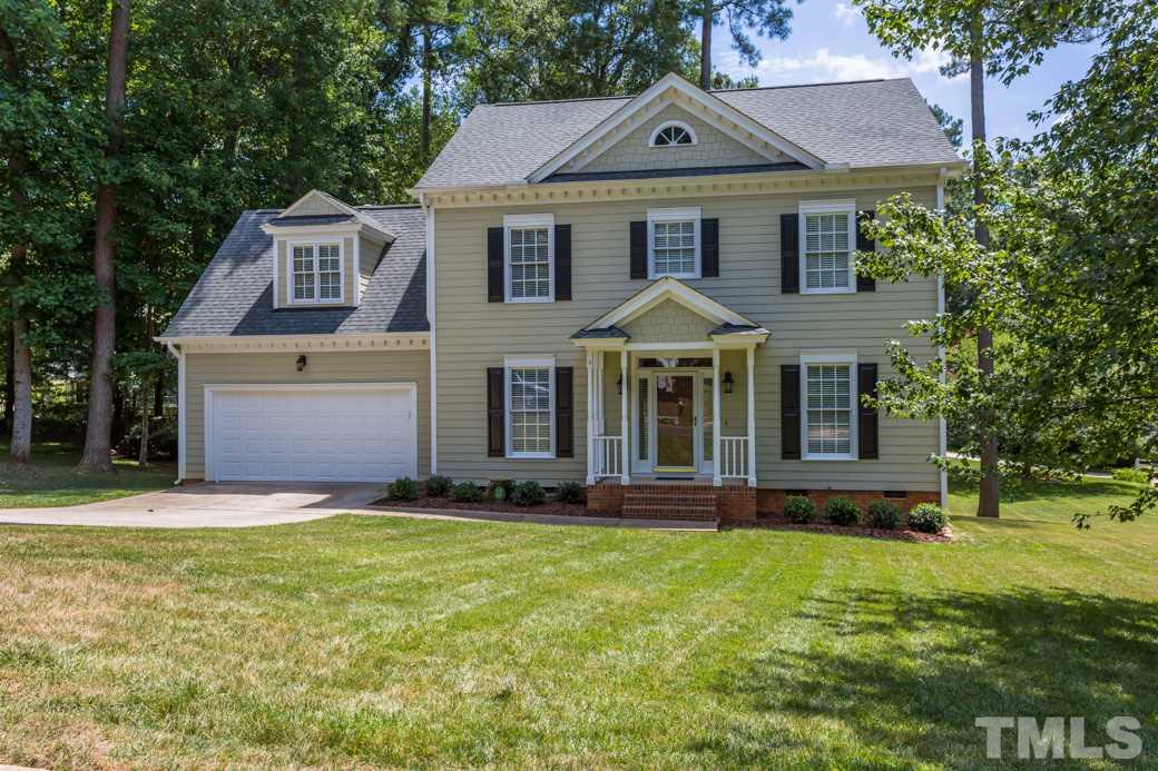 11817 Radner Way Raleigh, NC 27613 - Photo 14 of 15 a front view of a house with a yard