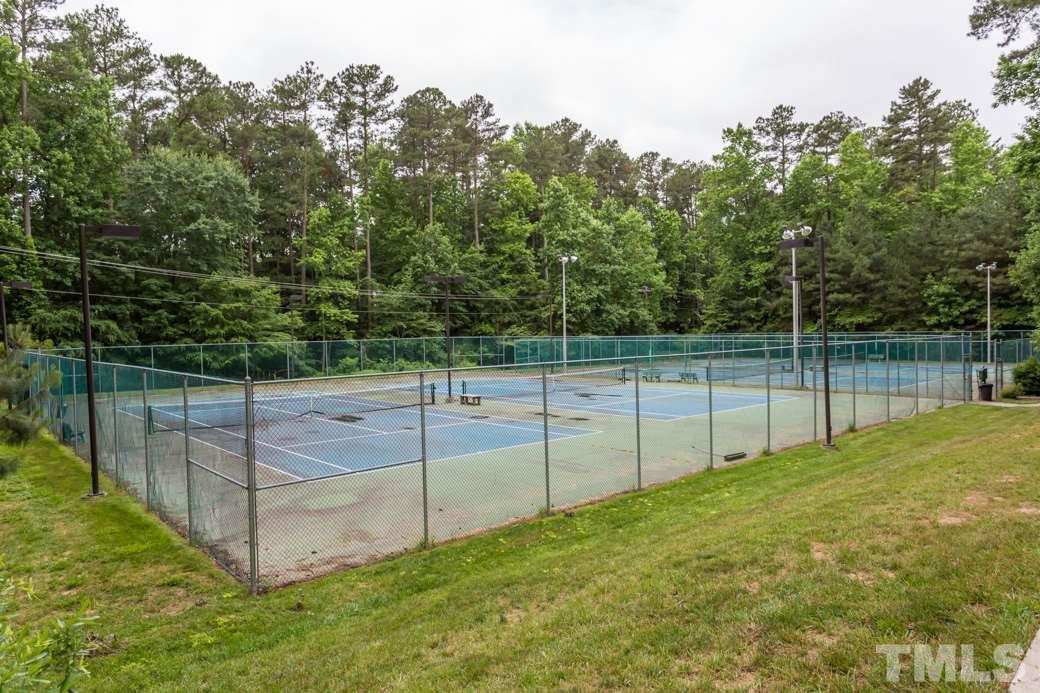 11817 Radner Way Raleigh, NC 27613 - Photo 12 of 15 a view of a backyard with fence