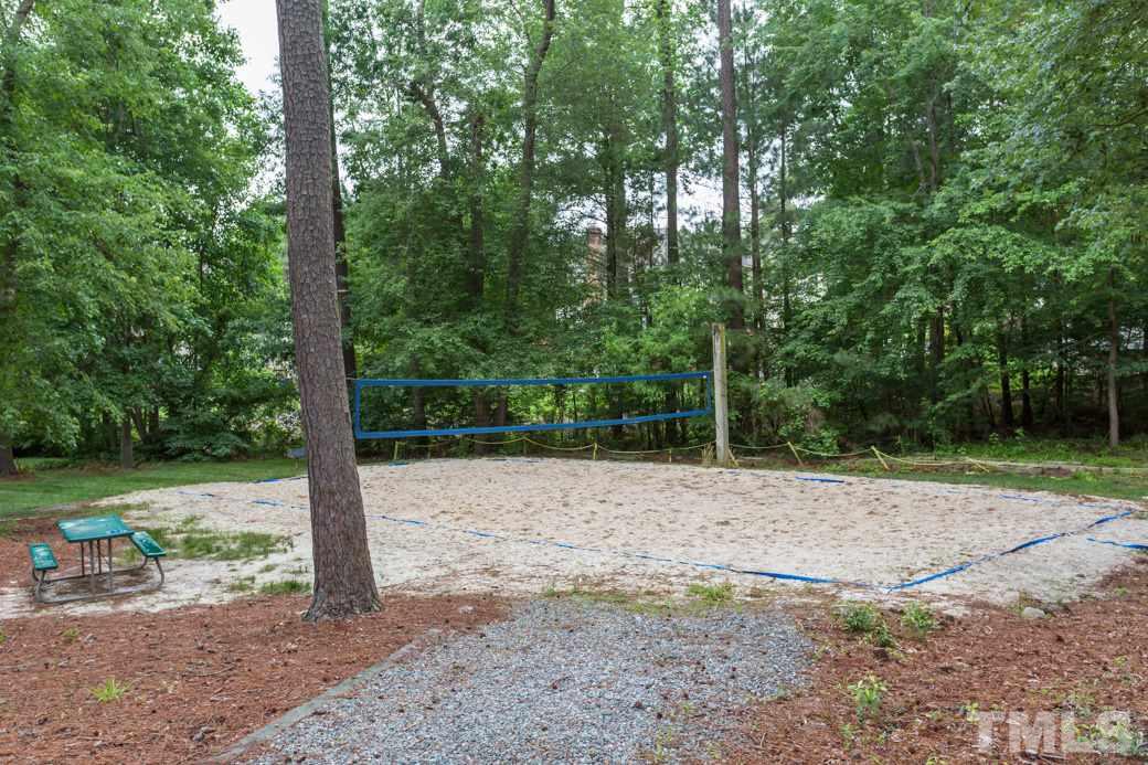 11817 Radner Way Raleigh, NC 27613 - Photo 13 of 15 a backyard of a house with lots of green space