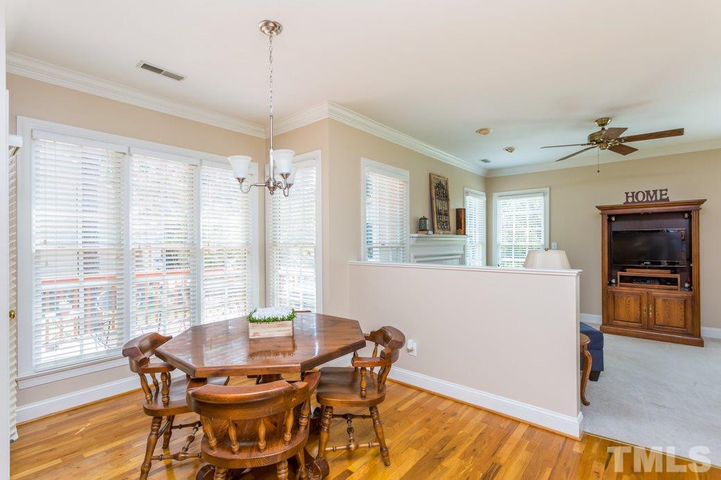 11817 Radner Way Raleigh, NC 27613 - Photo 8 of 15 a dining room with furniture and window