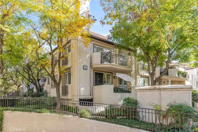 front view of a house with a small yard