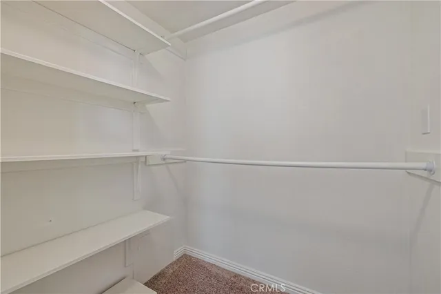 a view of small space with racks on the wall