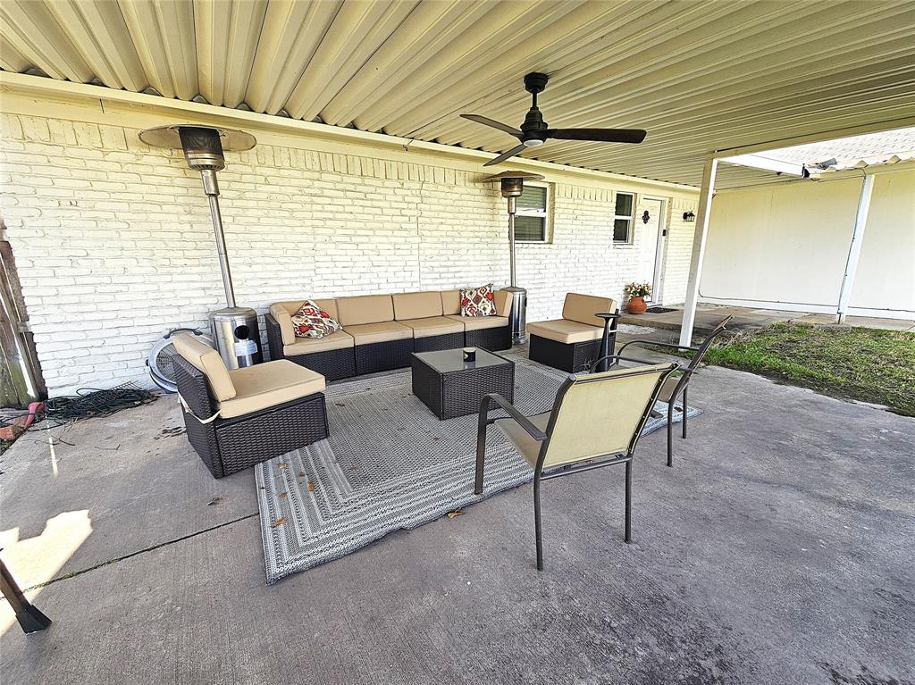 1205 West Trinity Street Groesbeck, TX 76642 - Photo 21 of 28 a outdoor living space with furniture