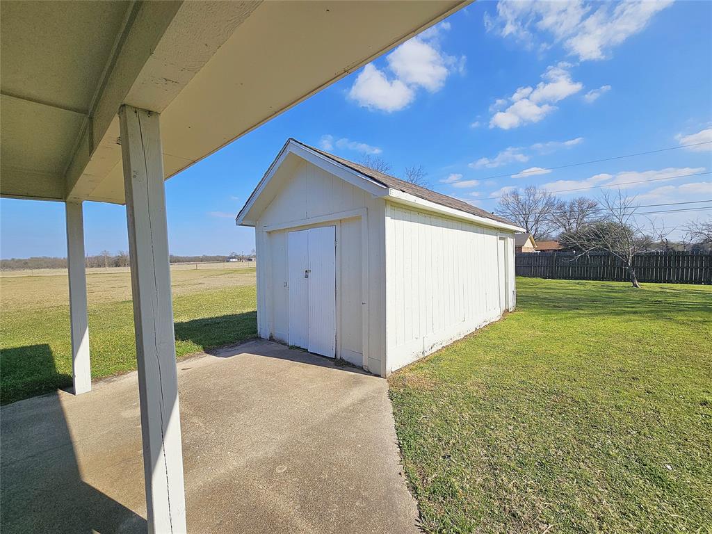 1205 West Trinity Street Groesbeck, TX 76642 - Photo 24 of 28 a view of backyard of the house