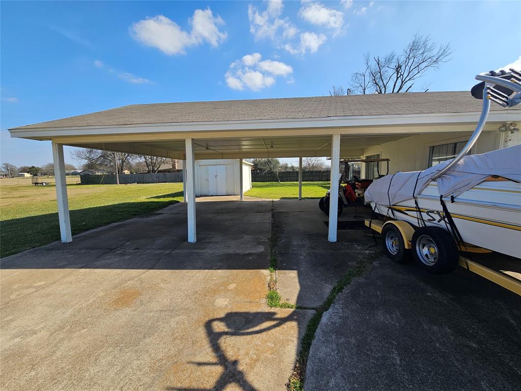 1205 West Trinity Street Groesbeck, TX 76642 - Photo 26 of 28 a view of a parking garage