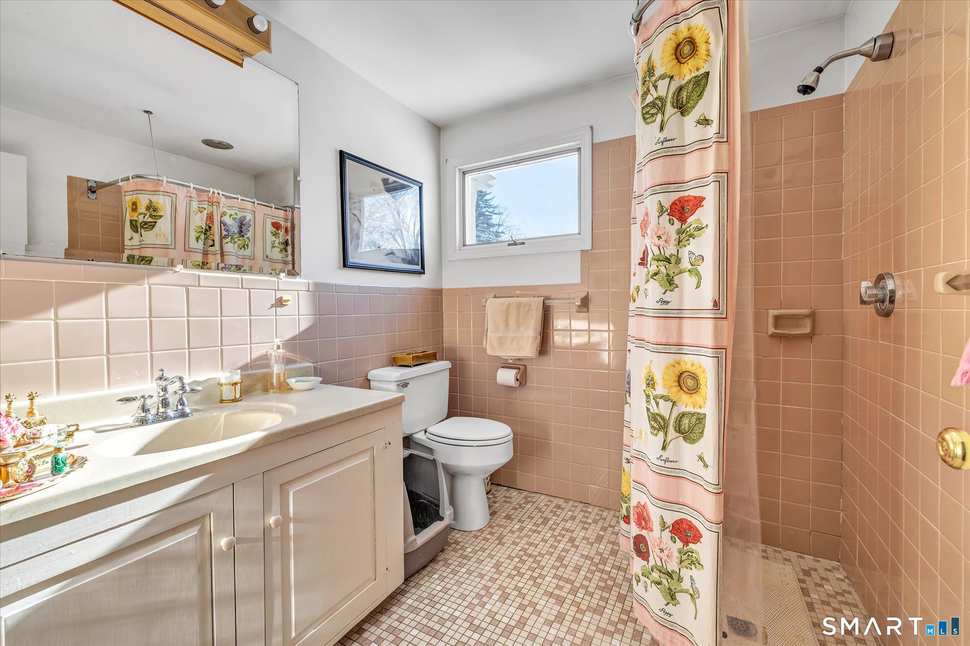 5695 Main Street Stratford, CT 06614 - Photo 12 of 40 a bathroom with a granite countertop toilet sink and mirror