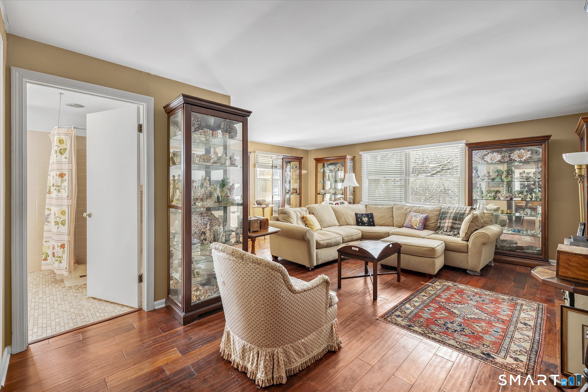 5695 Main Street Stratford, CT 06614 - Photo 13 of 40 a living room with furniture and a large window
