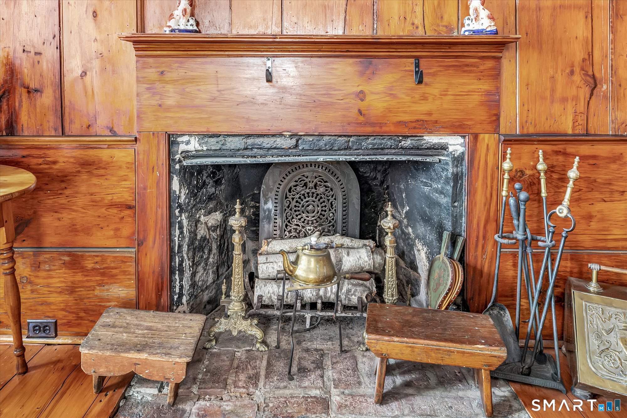 5695 Main Street Stratford, CT 06614 - Photo 22 of 40 a living room with furniture and a fireplace