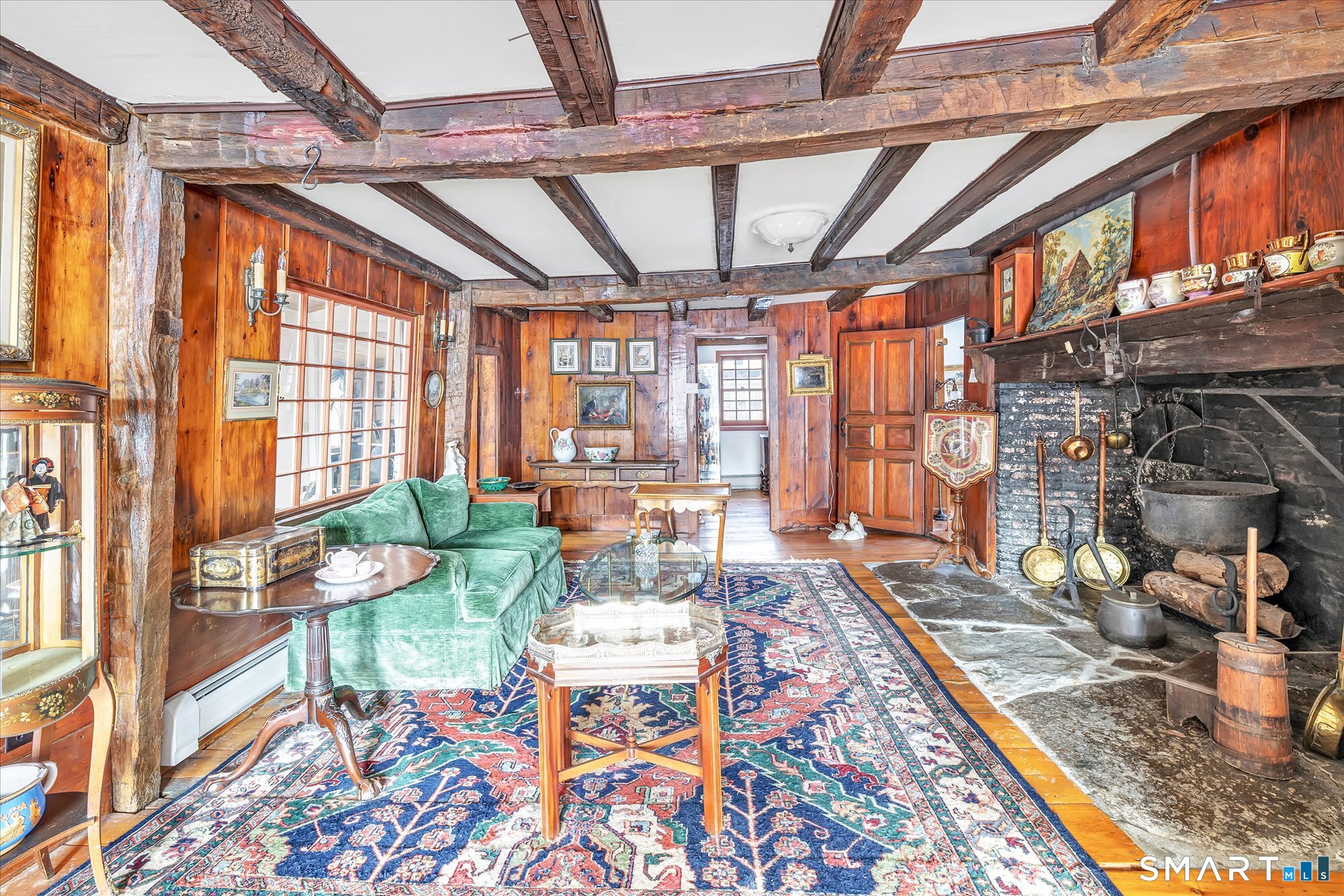 5695 Main Street Stratford, CT 06614 - Photo 28 of 40 a living room with furniture and a floor to ceiling window