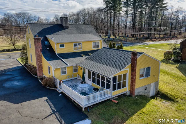 a aerial view of a house with swimming pool