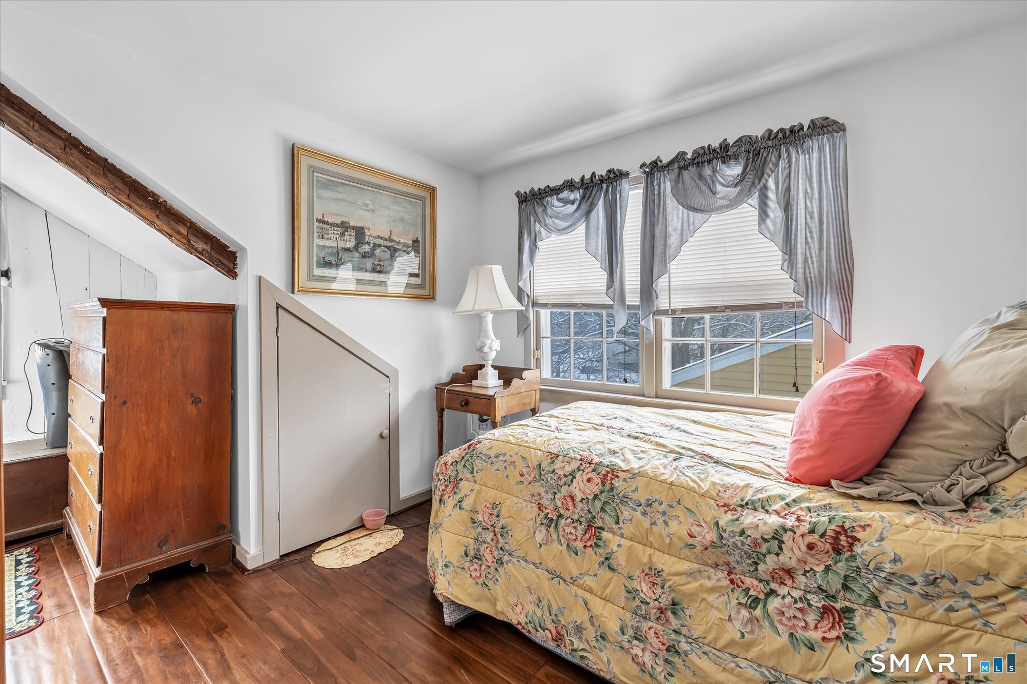 5695 Main Street Stratford, CT 06614 - Photo 31 of 40 a bedroom with a bed and a window