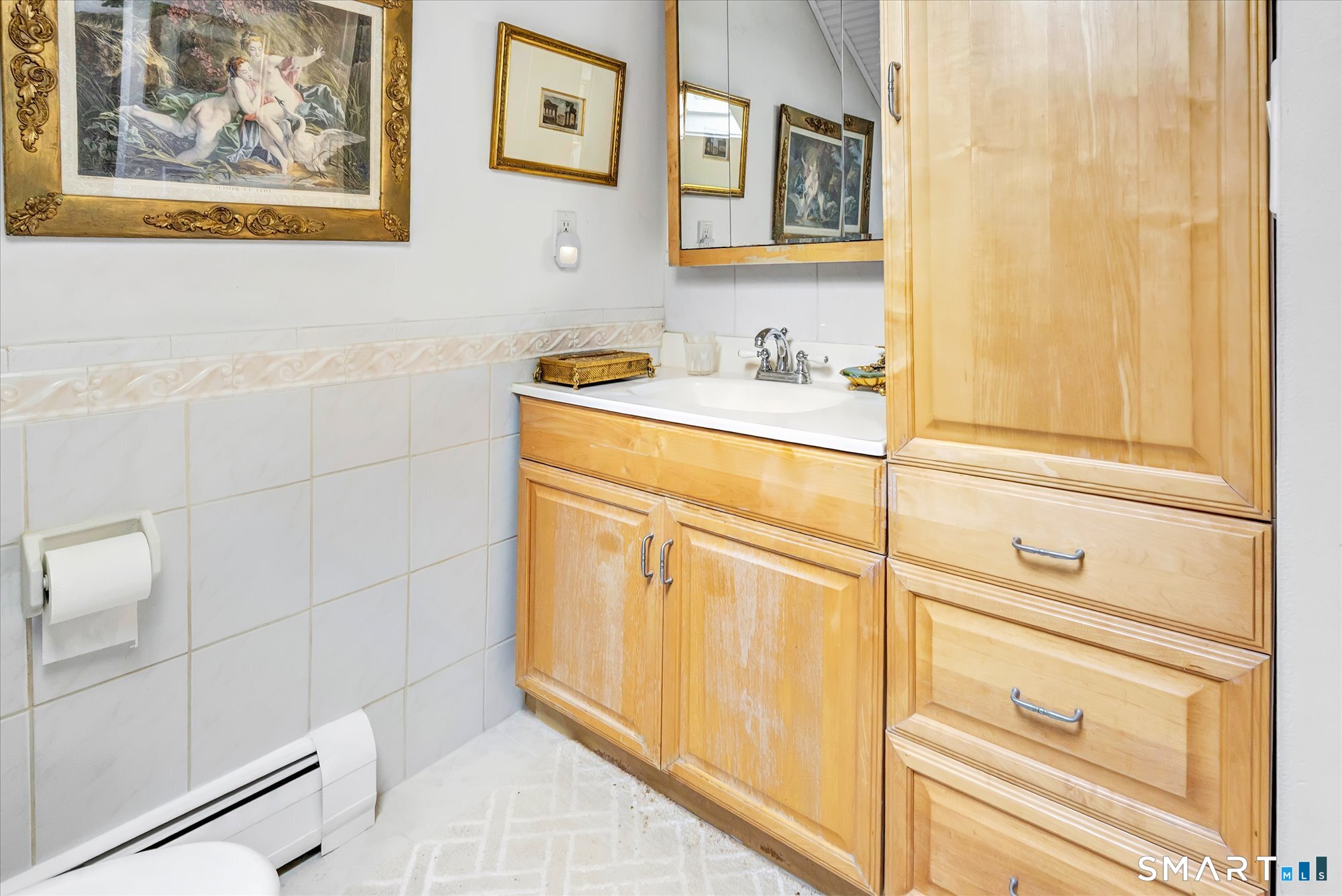 5695 Main Street Stratford, CT 06614 - Photo 40 of 40 a bathroom with a sink