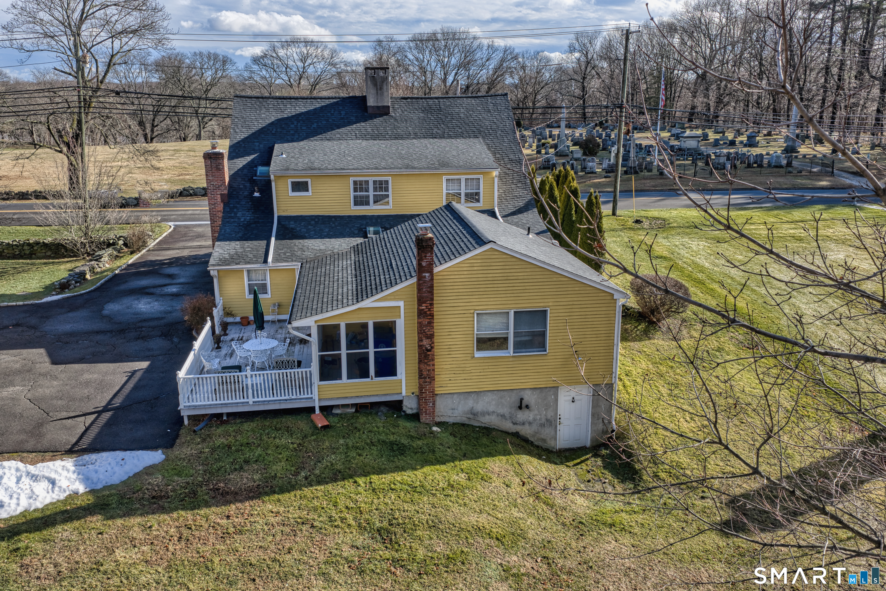 5695 Main Street Stratford, CT 06614 - Photo 4 of 40 a aerial view of a house with a yard