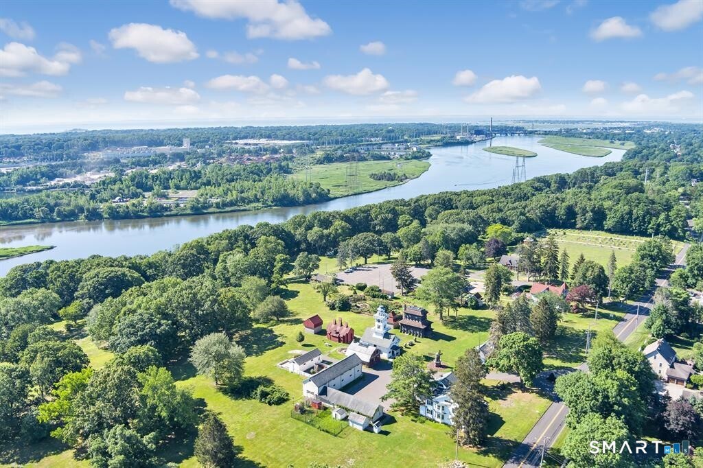 5695 Main Street Stratford, CT 06614 - Photo 6 of 40 a view of a lake with a city