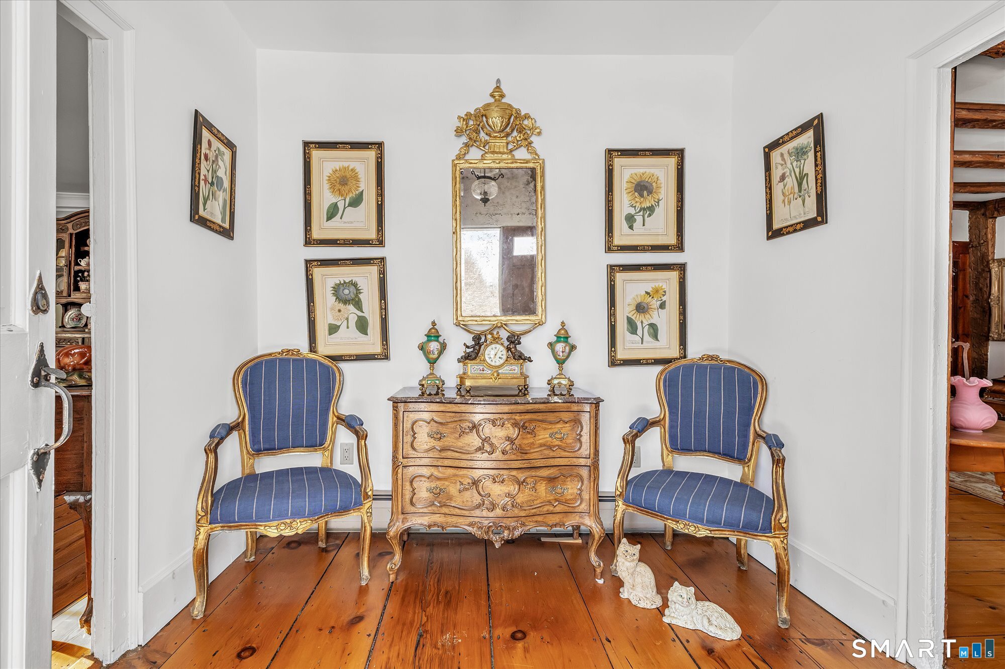 5695 Main Street Stratford, CT 06614 - Photo 7 of 40 a living room with furniture and painting on the wall