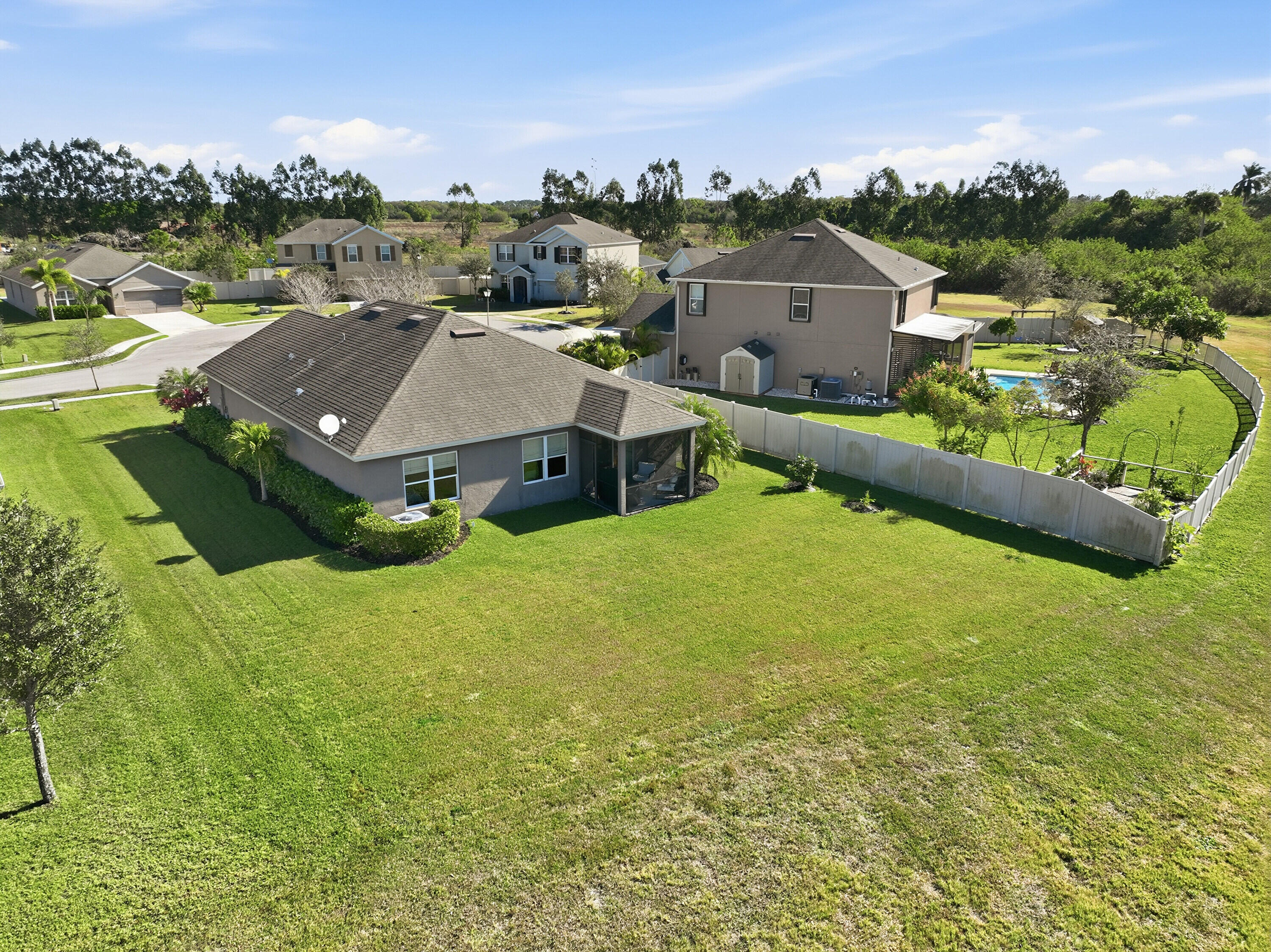3113 Yellowstone Circle Fort Pierce, FL 34945 - Photo 28 of 33 a view of a house with a big yard