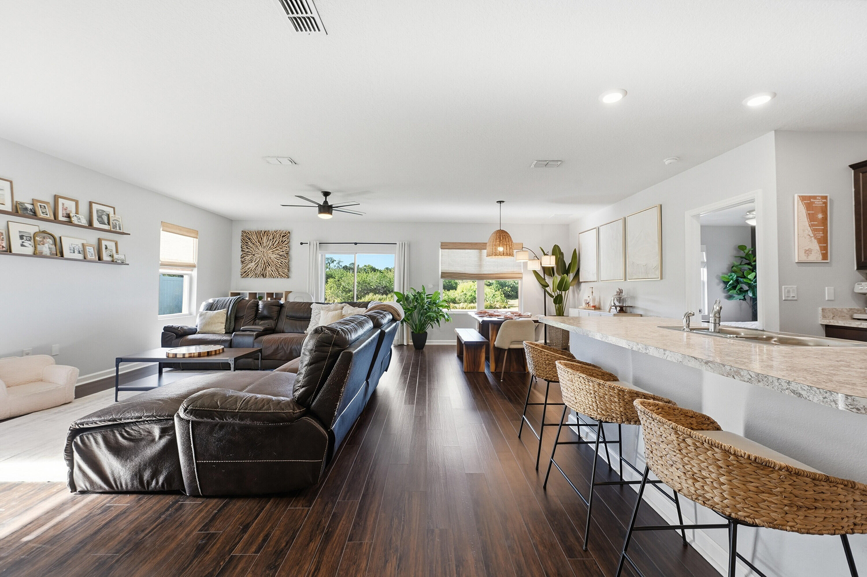 3113 Yellowstone Circle Fort Pierce, FL 34945 - Photo 4 of 33 a living room with furniture and wooden floor
