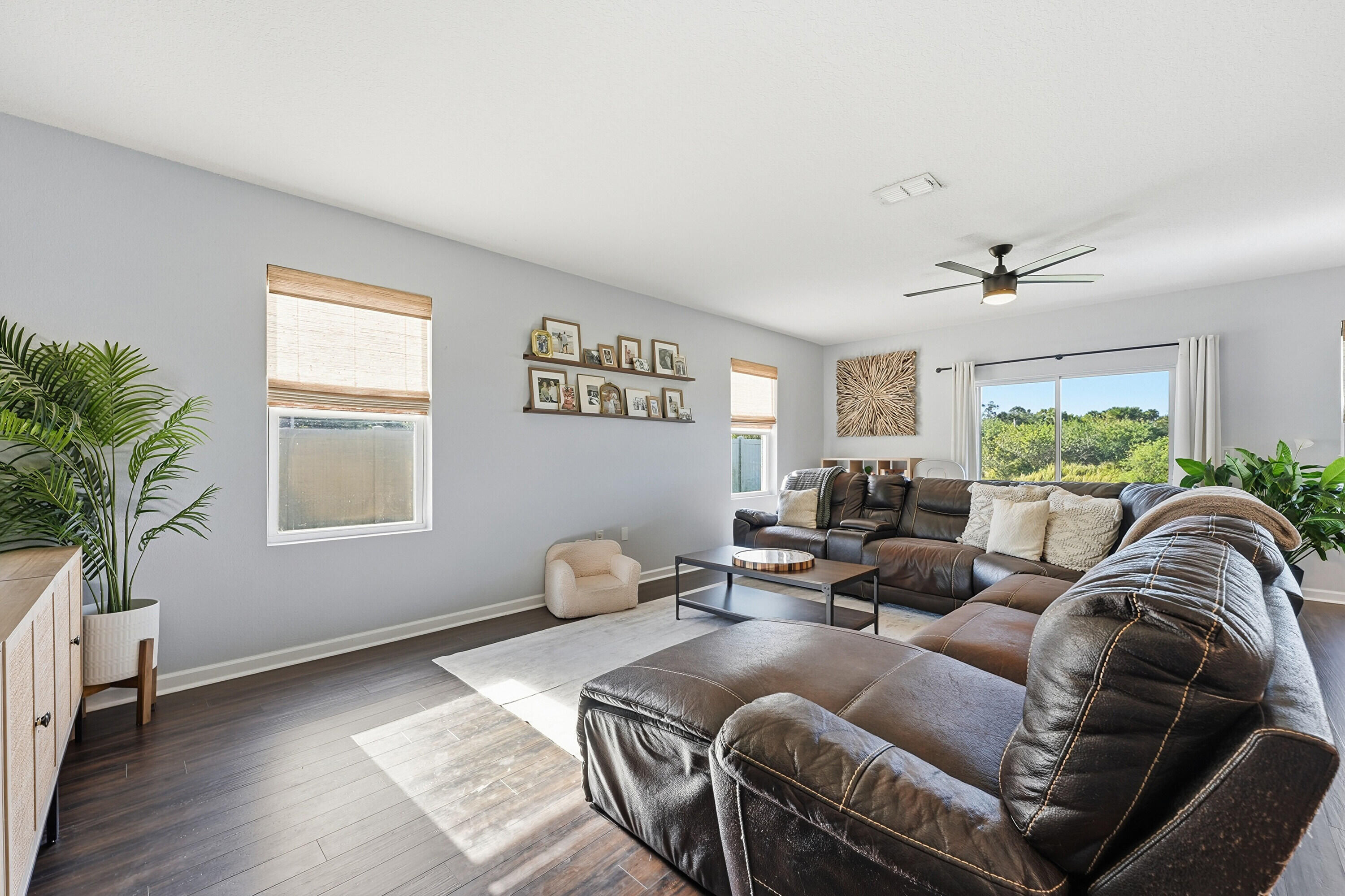 3113 Yellowstone Circle Fort Pierce, FL 34945 - Photo 5 of 33 a living room with furniture and a large window