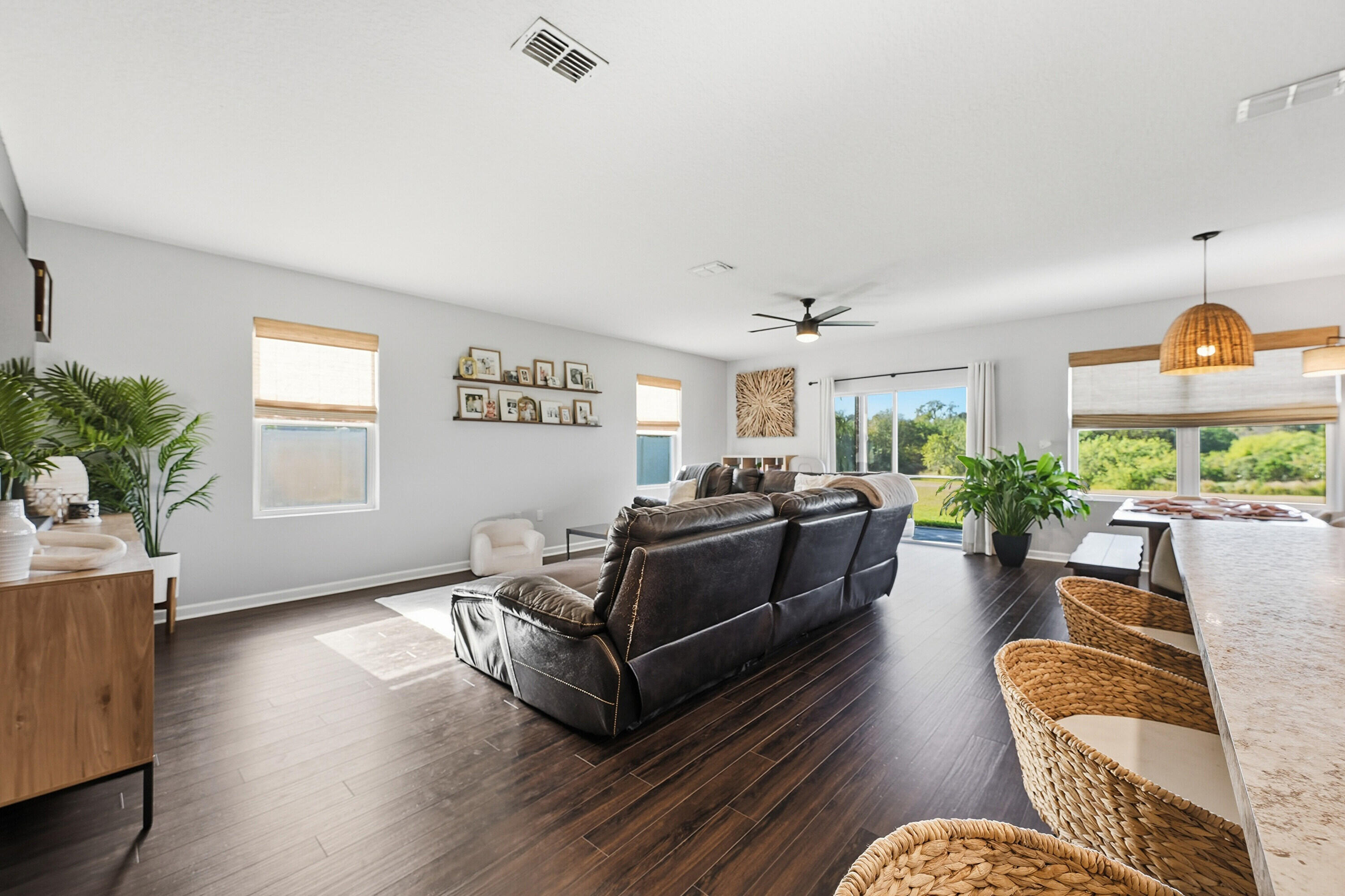 3113 Yellowstone Circle Fort Pierce, FL 34945 - Photo 7 of 33 a living room with furniture and a large window