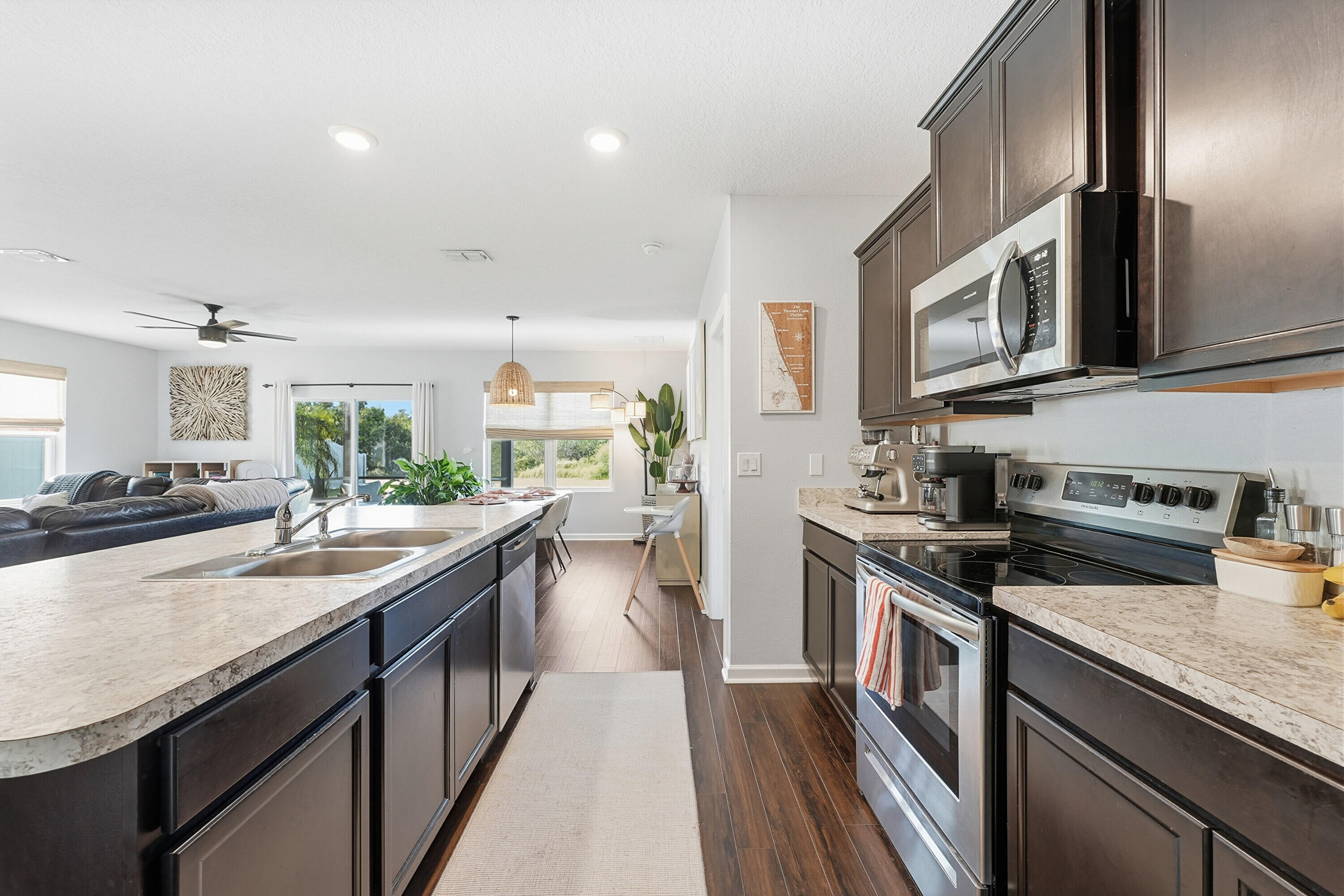 3113 Yellowstone Circle Fort Pierce, FL 34945 - Photo 10 of 33 a kitchen with stainless steel appliances granite countertop a stove and a sink