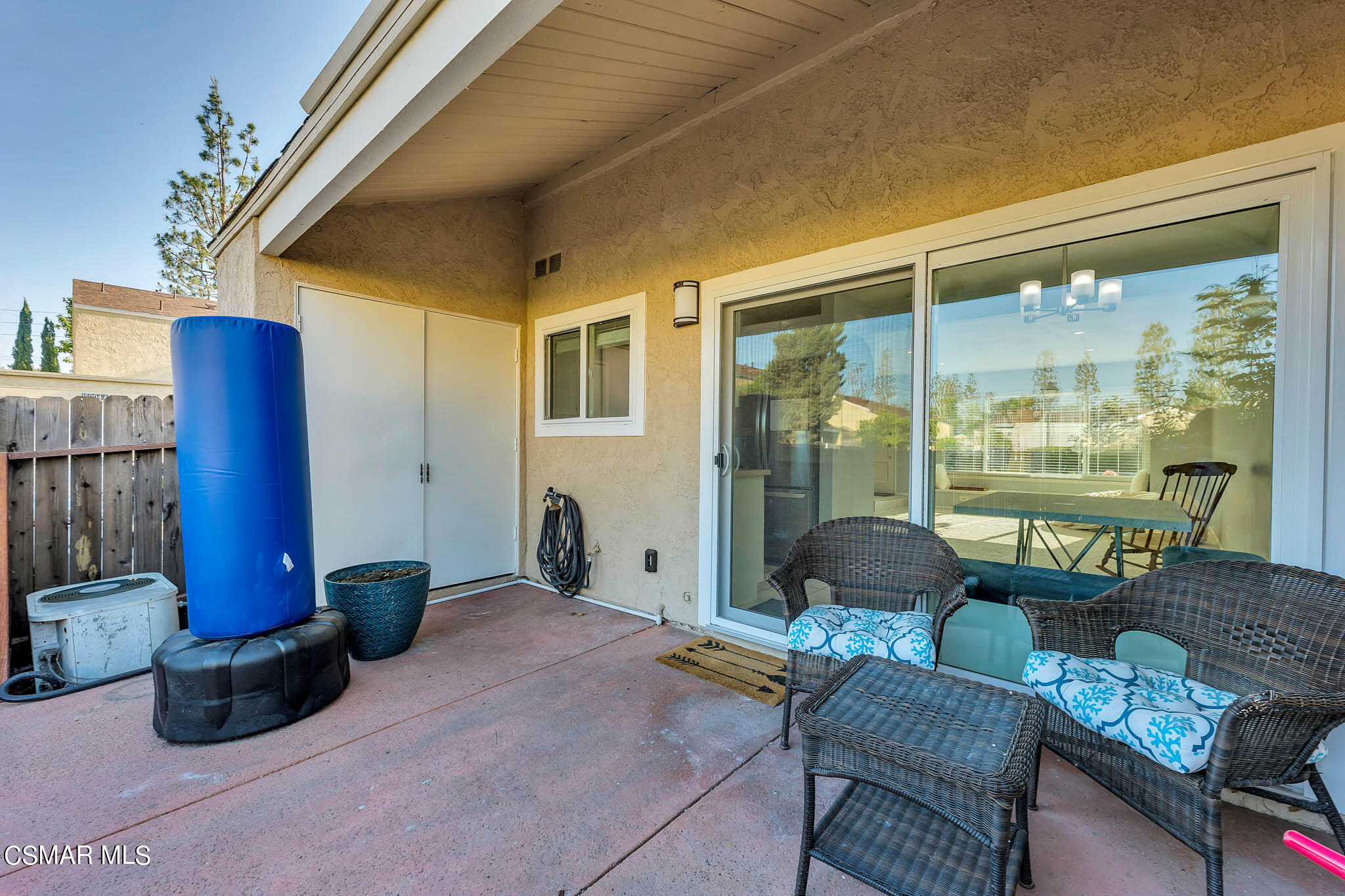 6486 Penn Street, Unit A Moorpark, CA 93021 - Photo 13 of 35 a living room with furniture and a floor to ceiling window