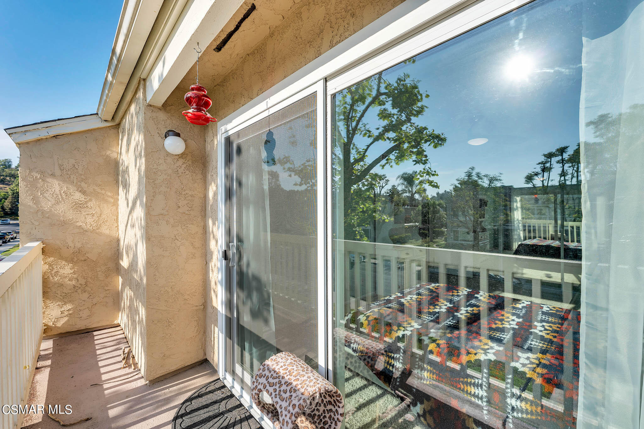 6486 Penn Street, Unit A Moorpark, CA 93021 - Photo 22 of 35 a view of balcony with wooden floor