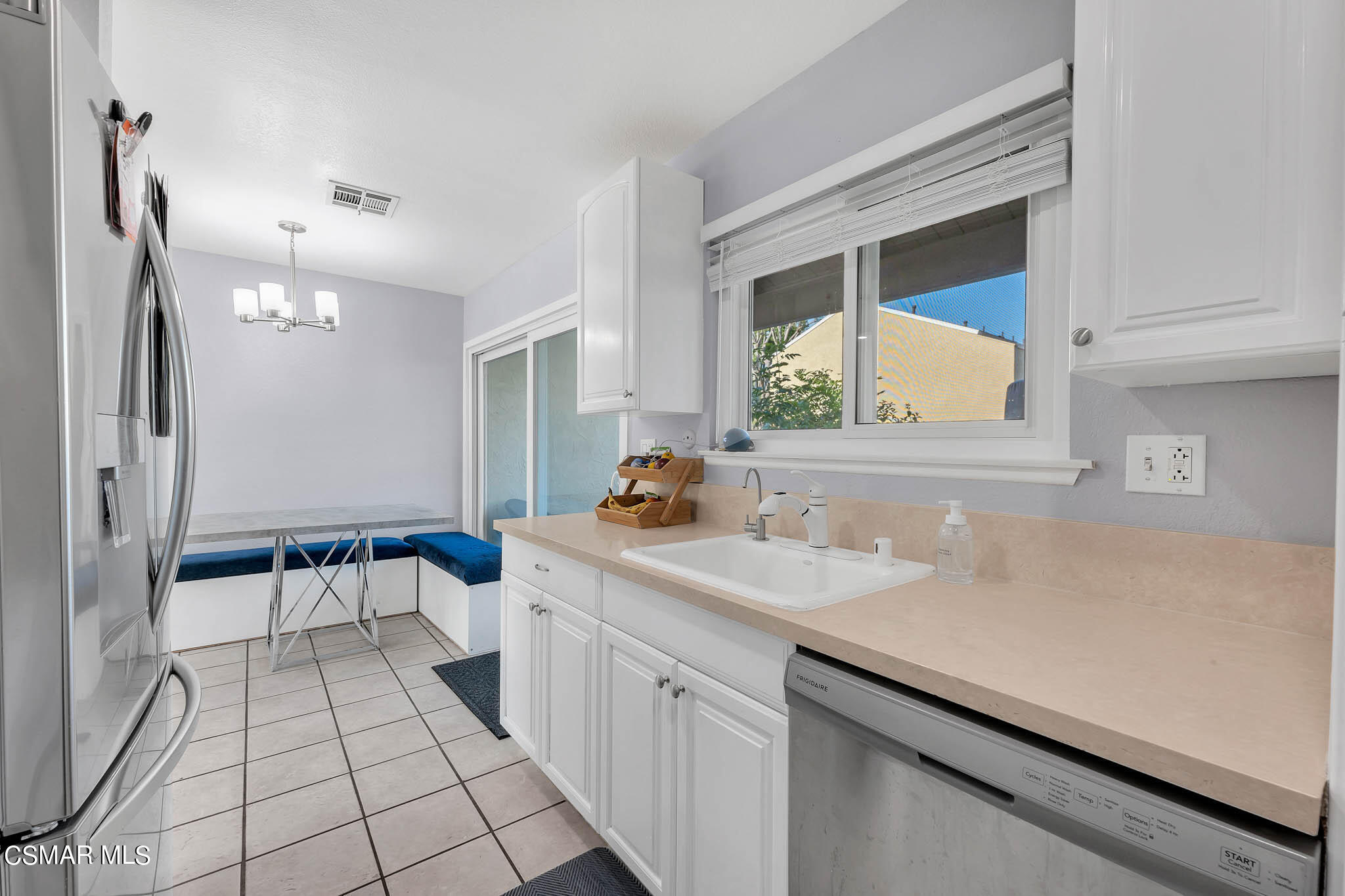 6486 Penn Street, Unit A Moorpark, CA 93021 - Photo 3 of 35 a spacious bathroom with a sink and a mirror