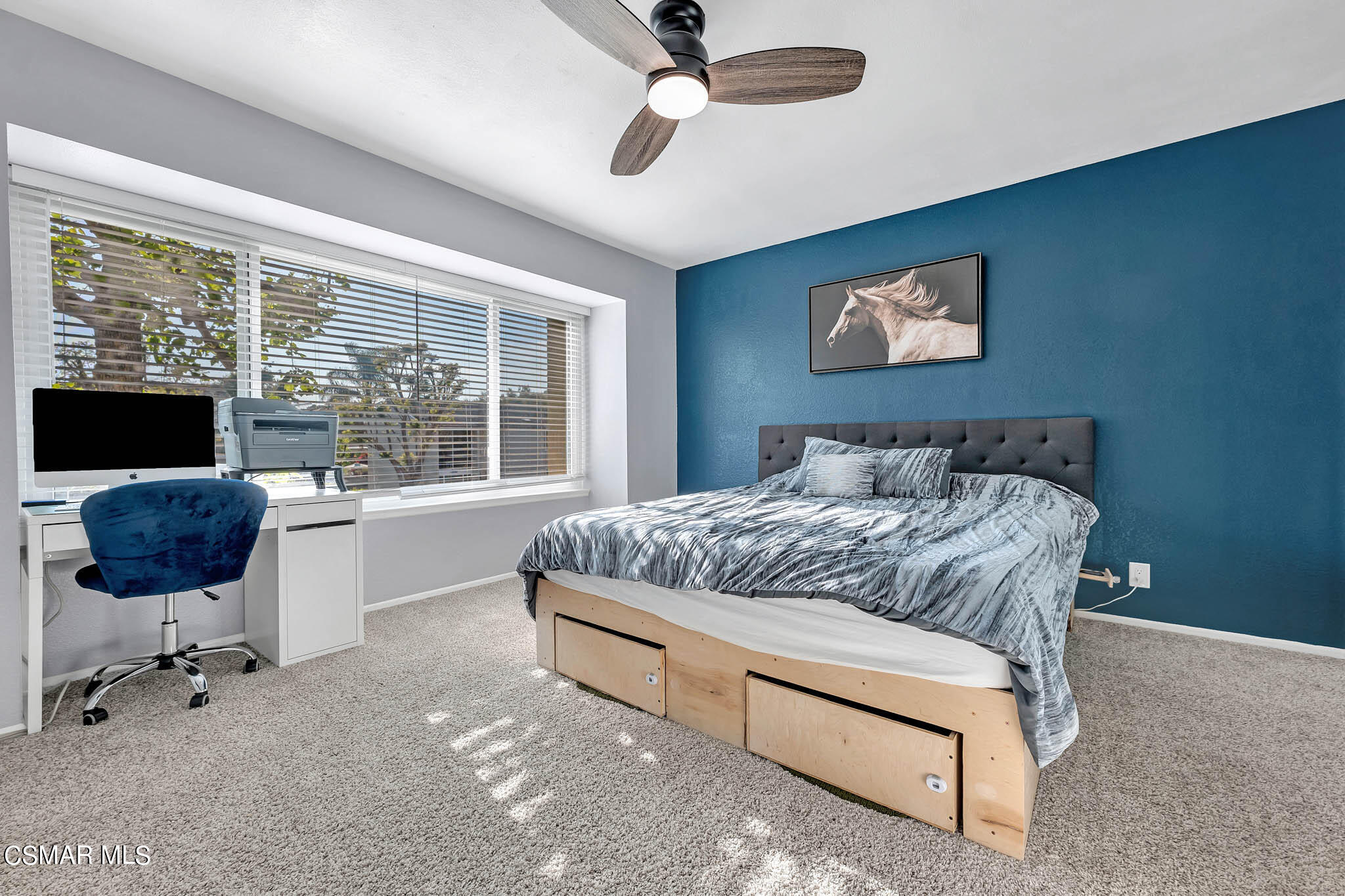 6486 Penn Street, Unit A Moorpark, CA 93021 - Photo 4 of 35 a bedroom with a bed and glass door