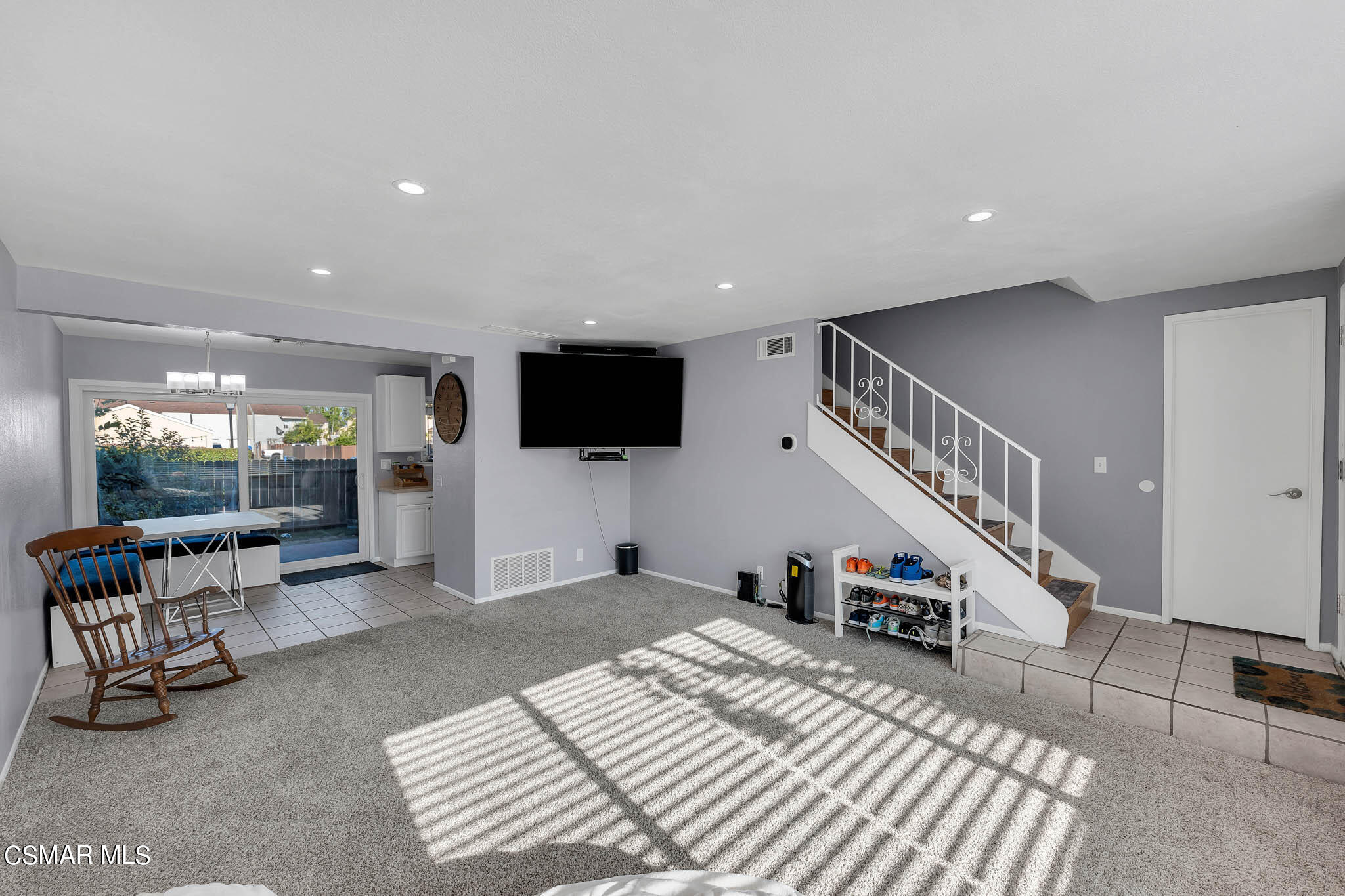 6486 Penn Street, Unit A Moorpark, CA 93021 - Photo 7 of 35 a living room with furniture and a flat screen tv