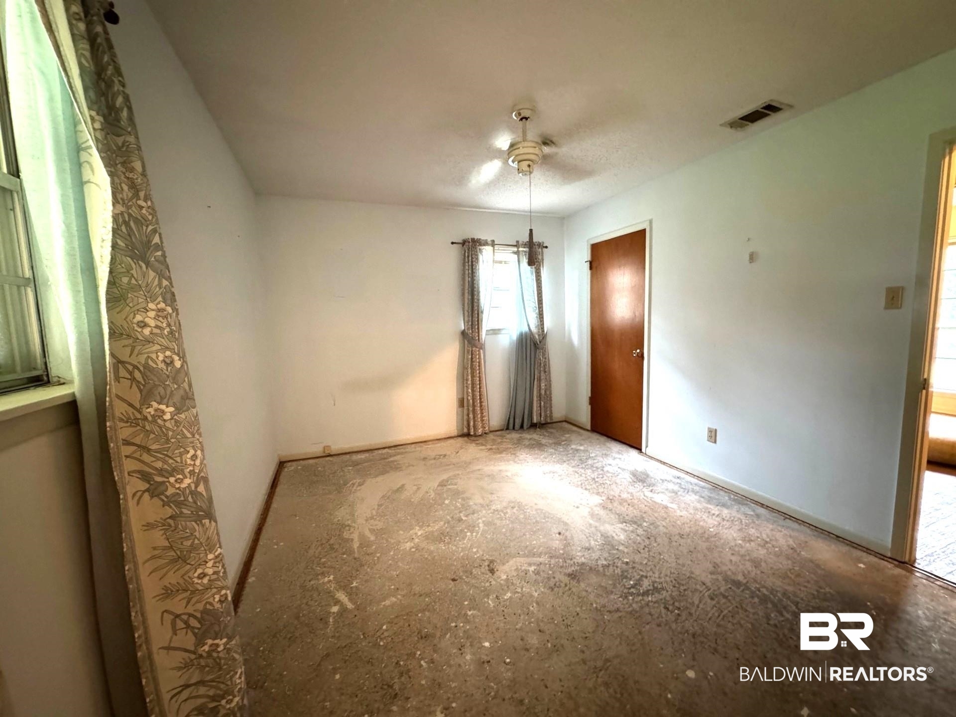 5198 Lancelot Drive Mobile, AL 36619 - Photo 16 of 30 Unfurnished bedroom featuring a ceiling fan and baseboards