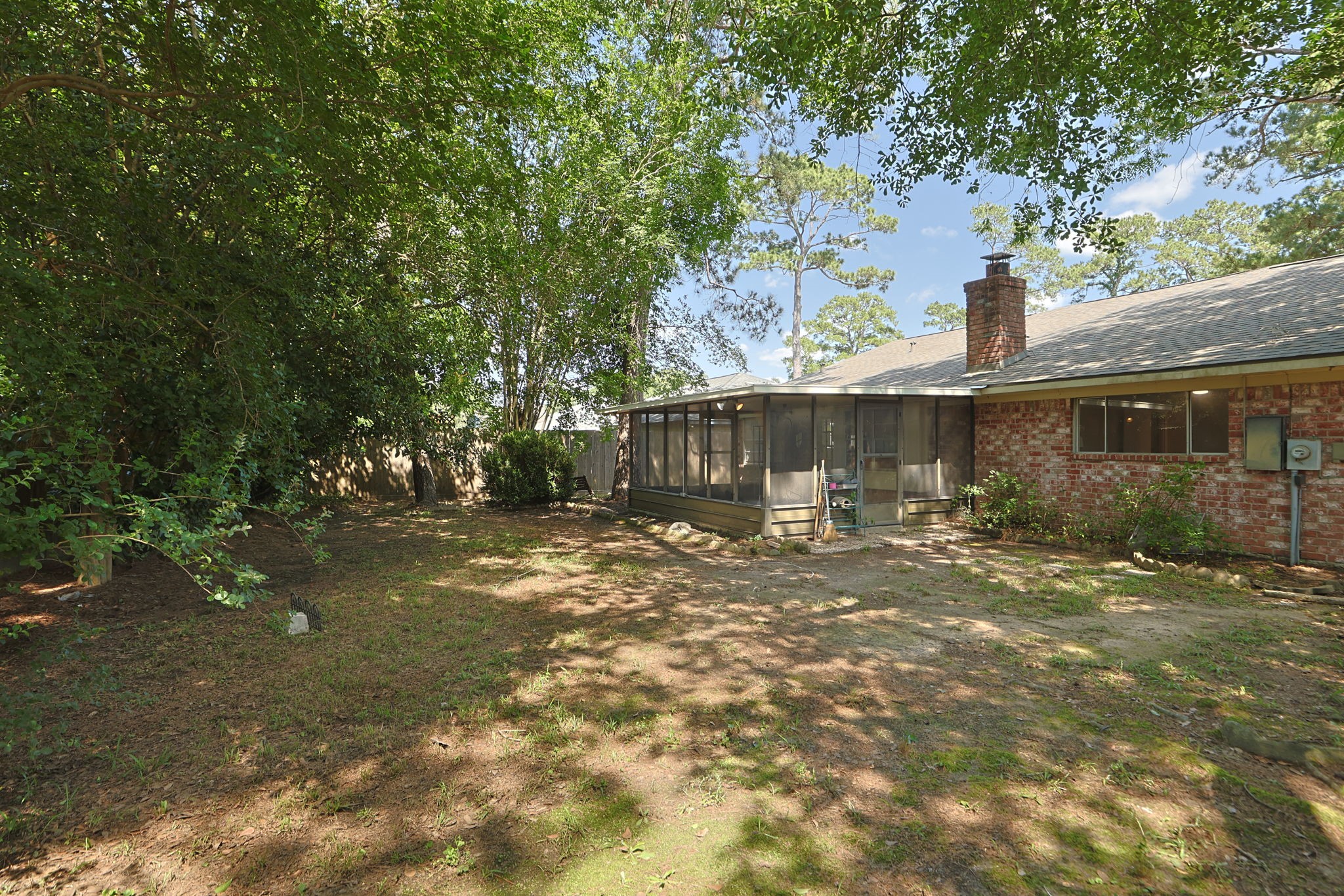 9618 Rannock Way Spring, TX 77379 - Photo 22 of 24 a view of a house with yard and sitting area