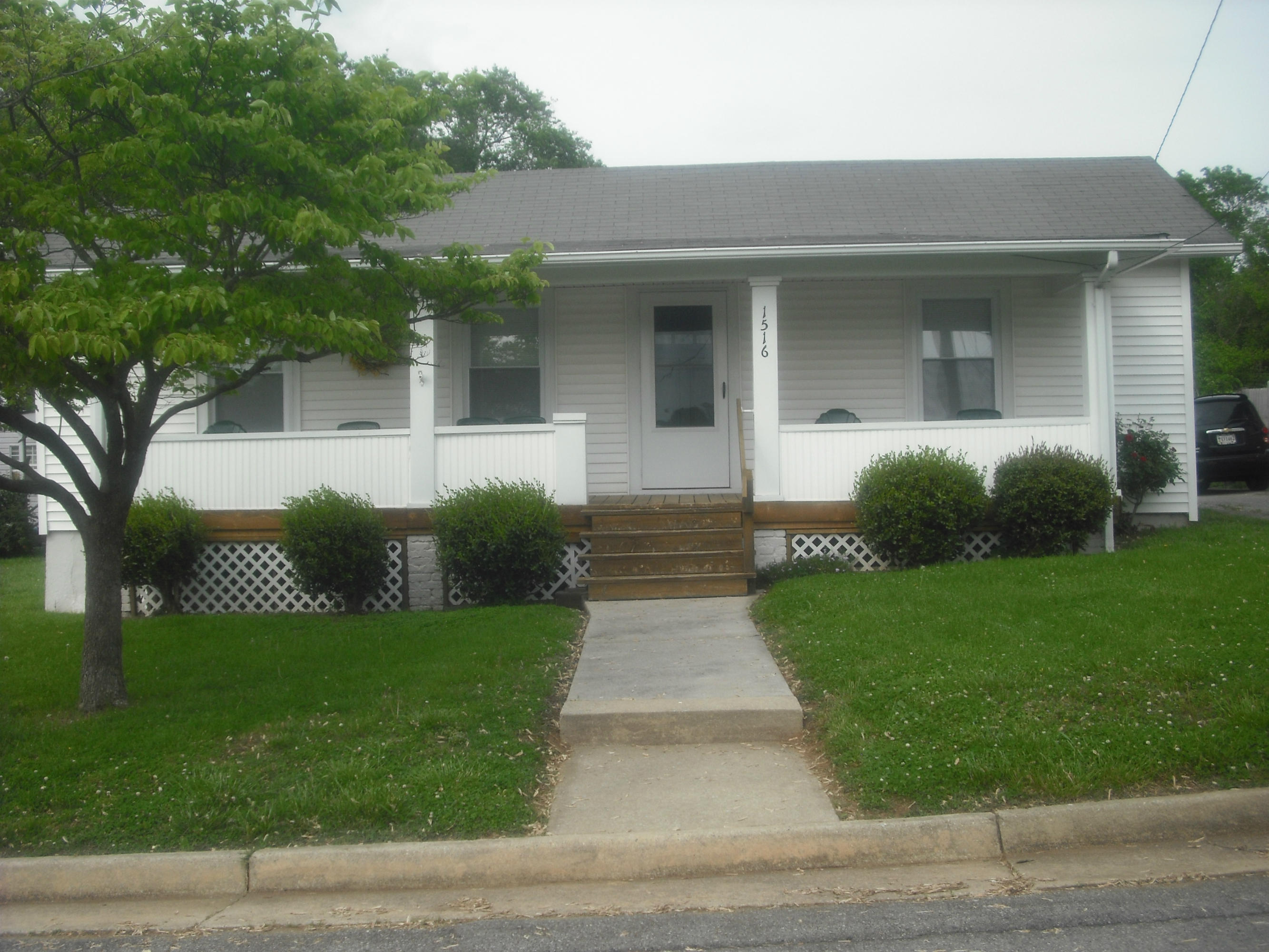 1516 Riverside Terrace Southeast Roanoke, VA 24014 - Photo 12 of 12 a view of a house with a yard and plants